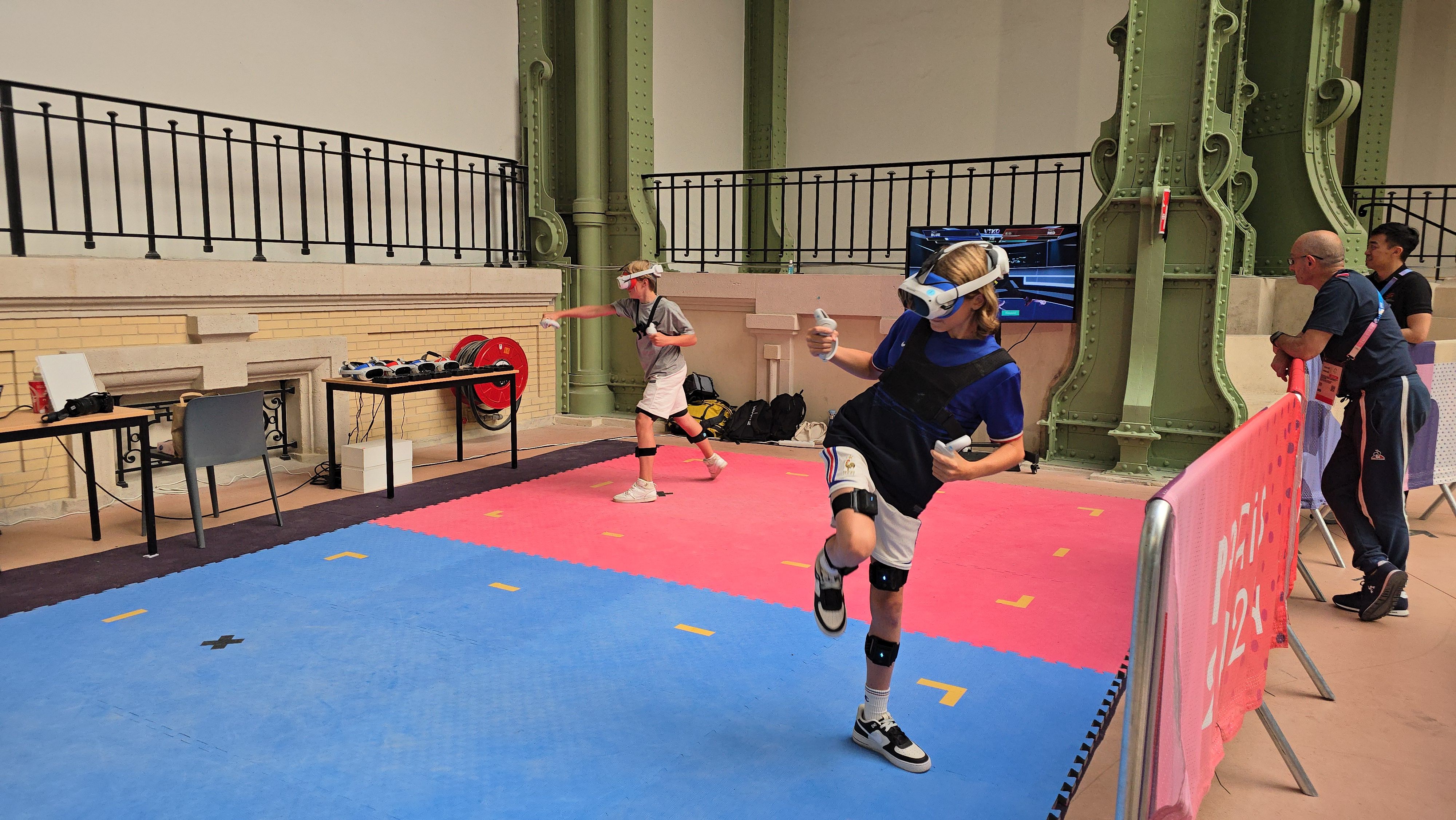 Two children playing with the VTKD system