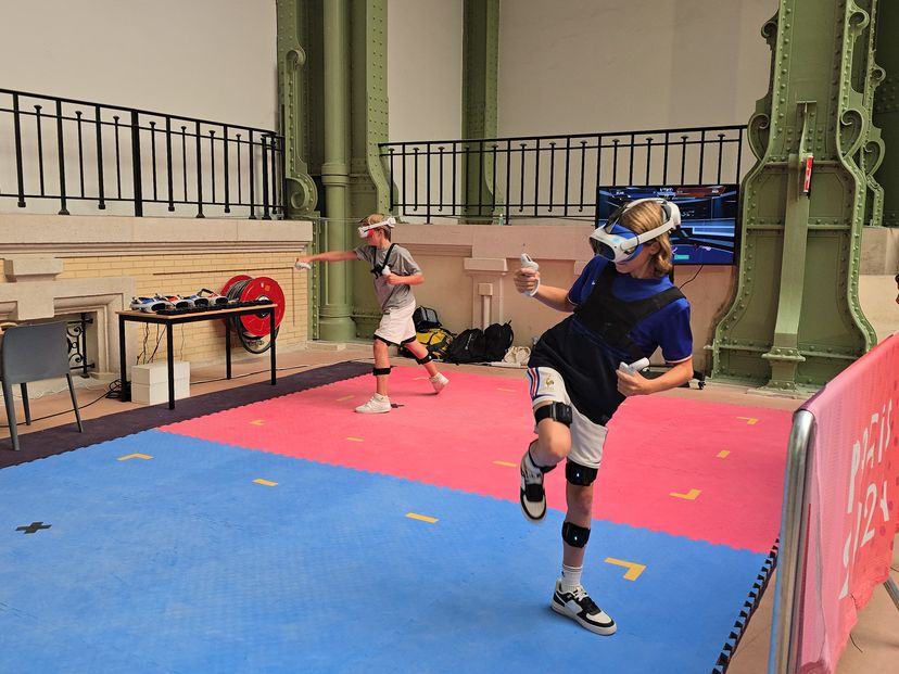 Two children playing with the VTKD system