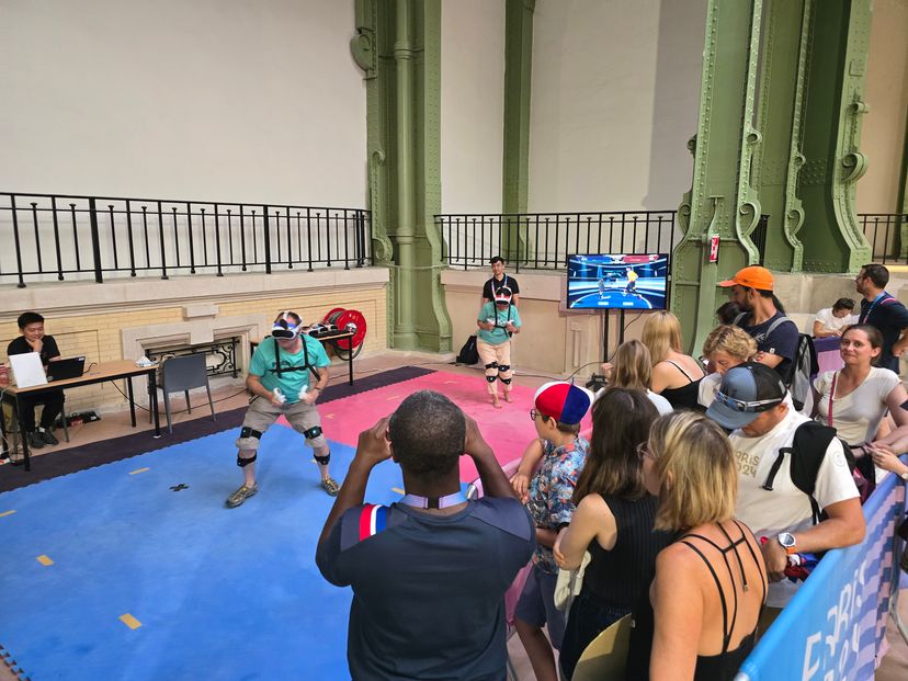 People watching someone playing VTKD