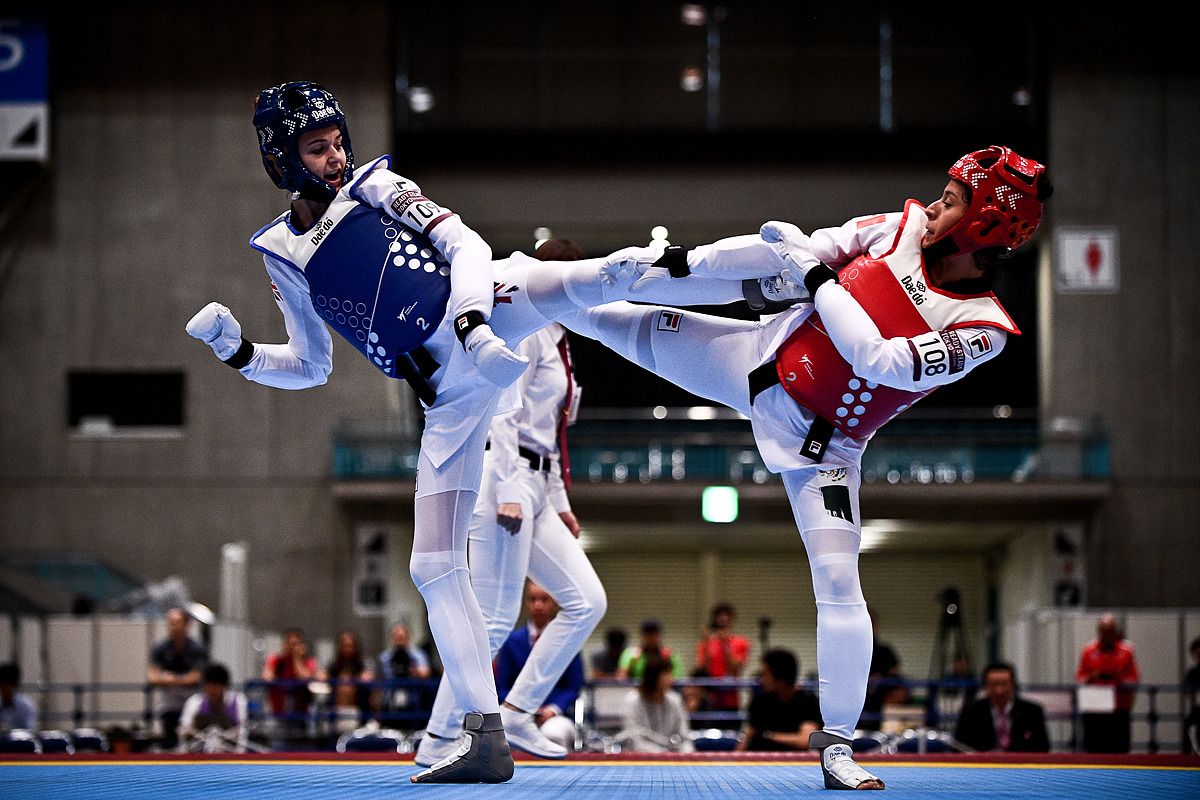 Two Taekwondo Athletes Sparring at Tokyo 2020