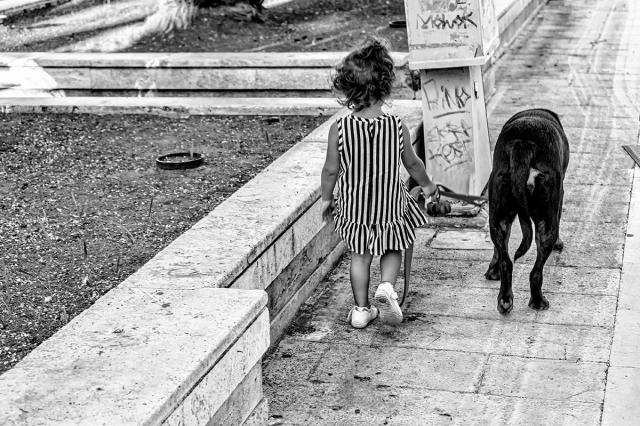 Street and beach photography..."Se fotografi uno sconosciuto, nell’istante stesso in cui fai scattare l’otturatore,…