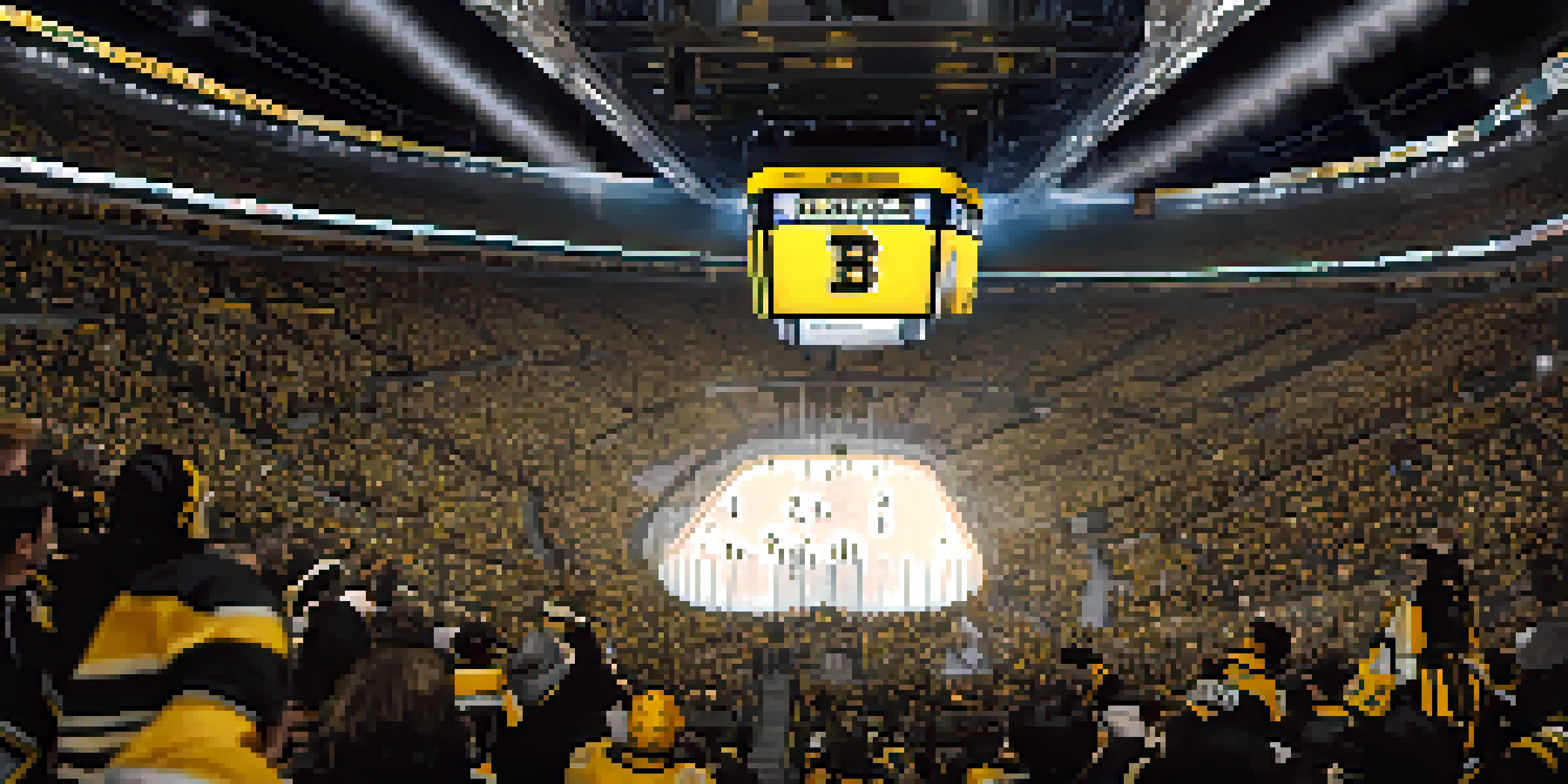 A crowded arena filled with enthusiastic Boston Bruins fans, cheering for their team during a home game.