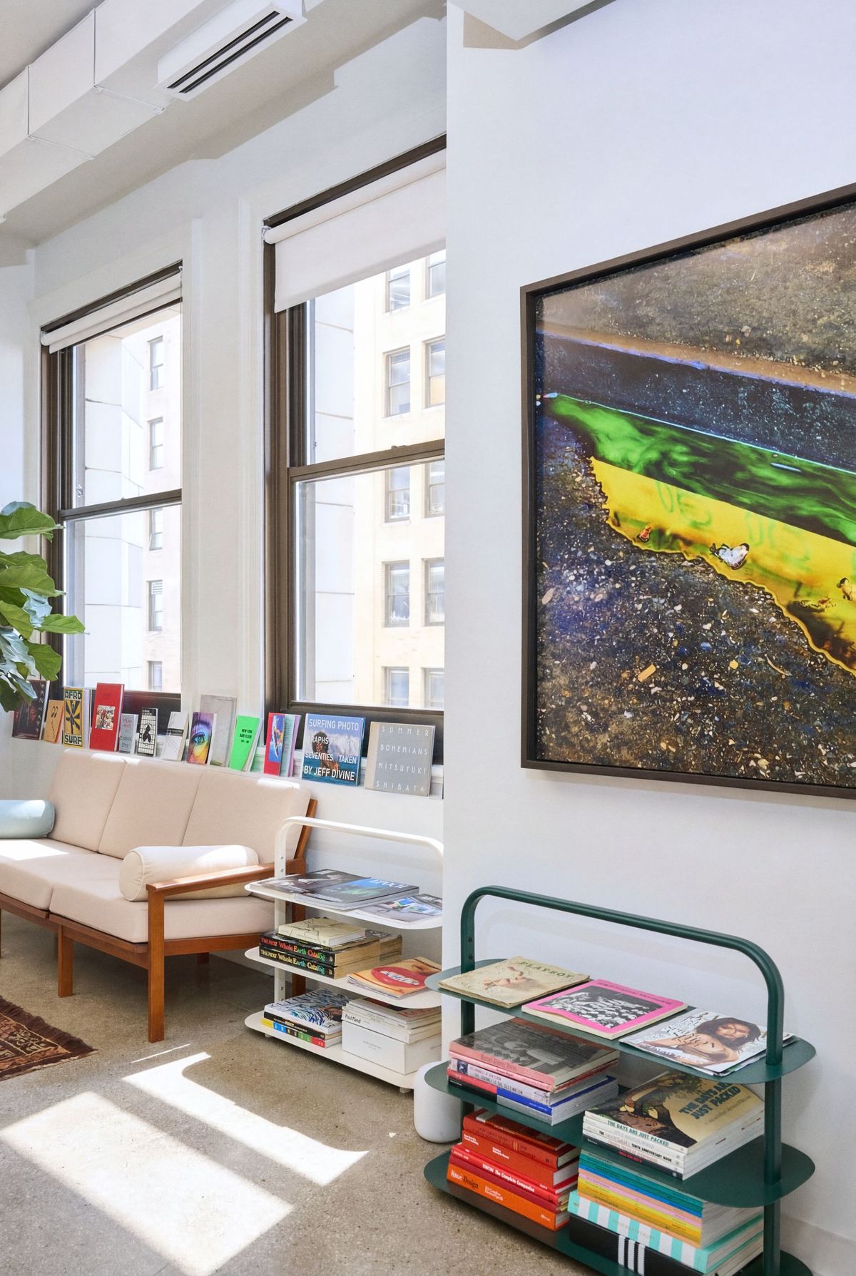 Little Plains office — lounge and framed artwork