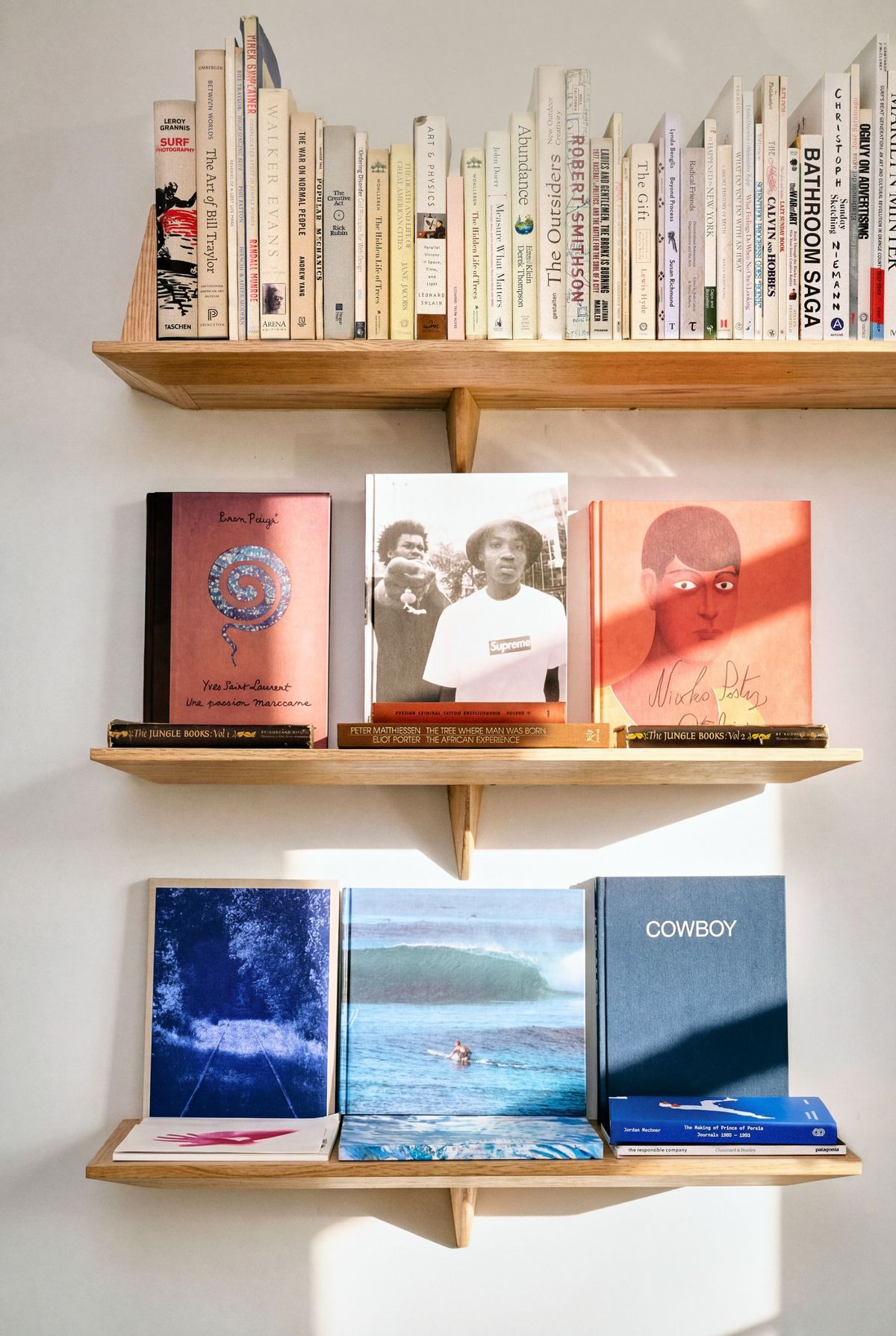 Little Plains office — curated bookshelves
