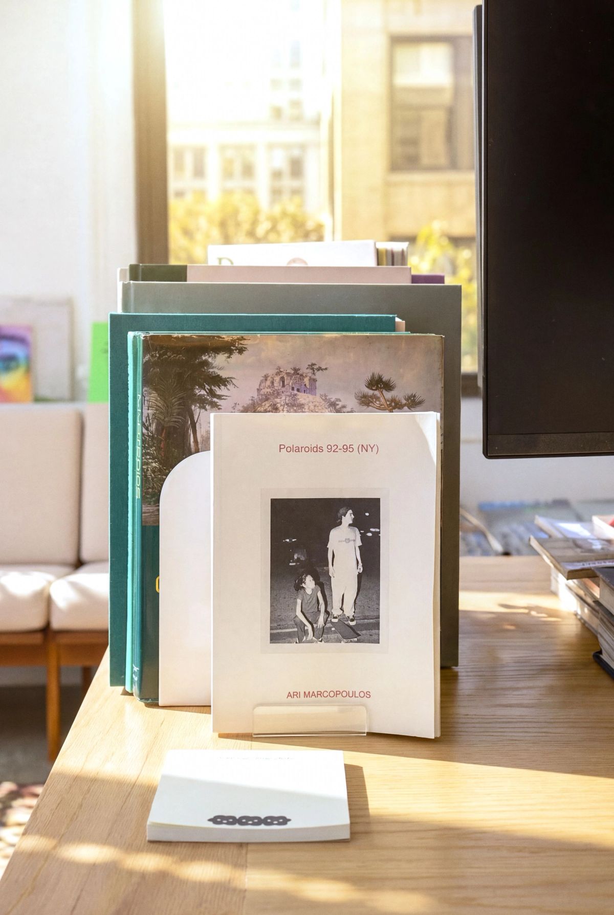 Little Plains office — art books on a desk