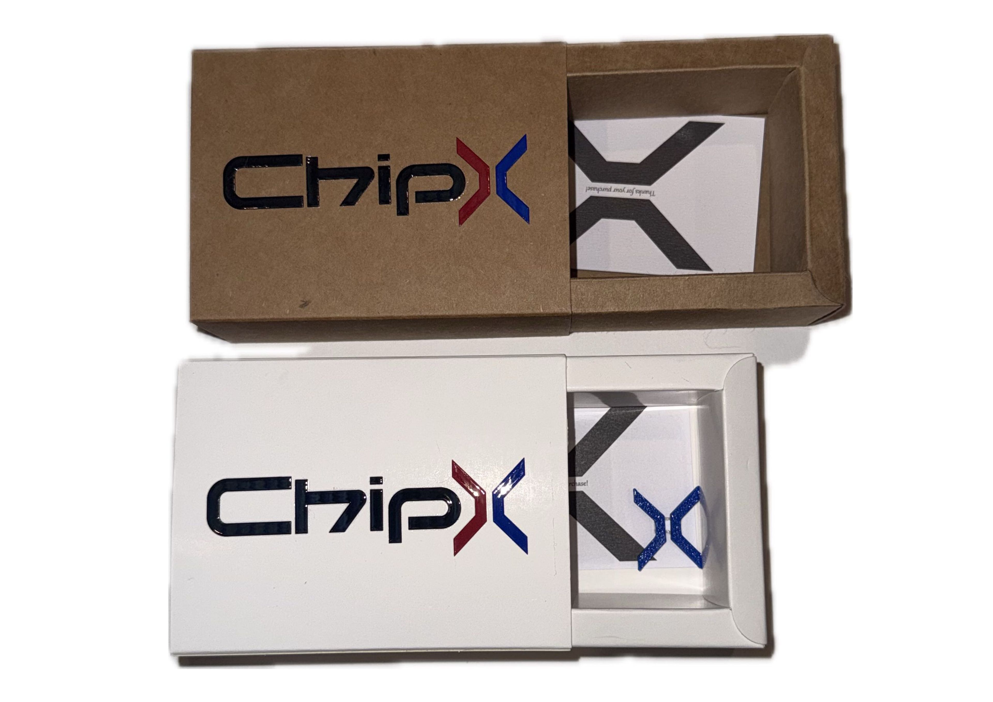 Two sliding boxes featuring the "ChipX" logo on the lids. The boxes, one brown and one white, are partially open, revealing a card inside with a bold "X" symbol in black and white.