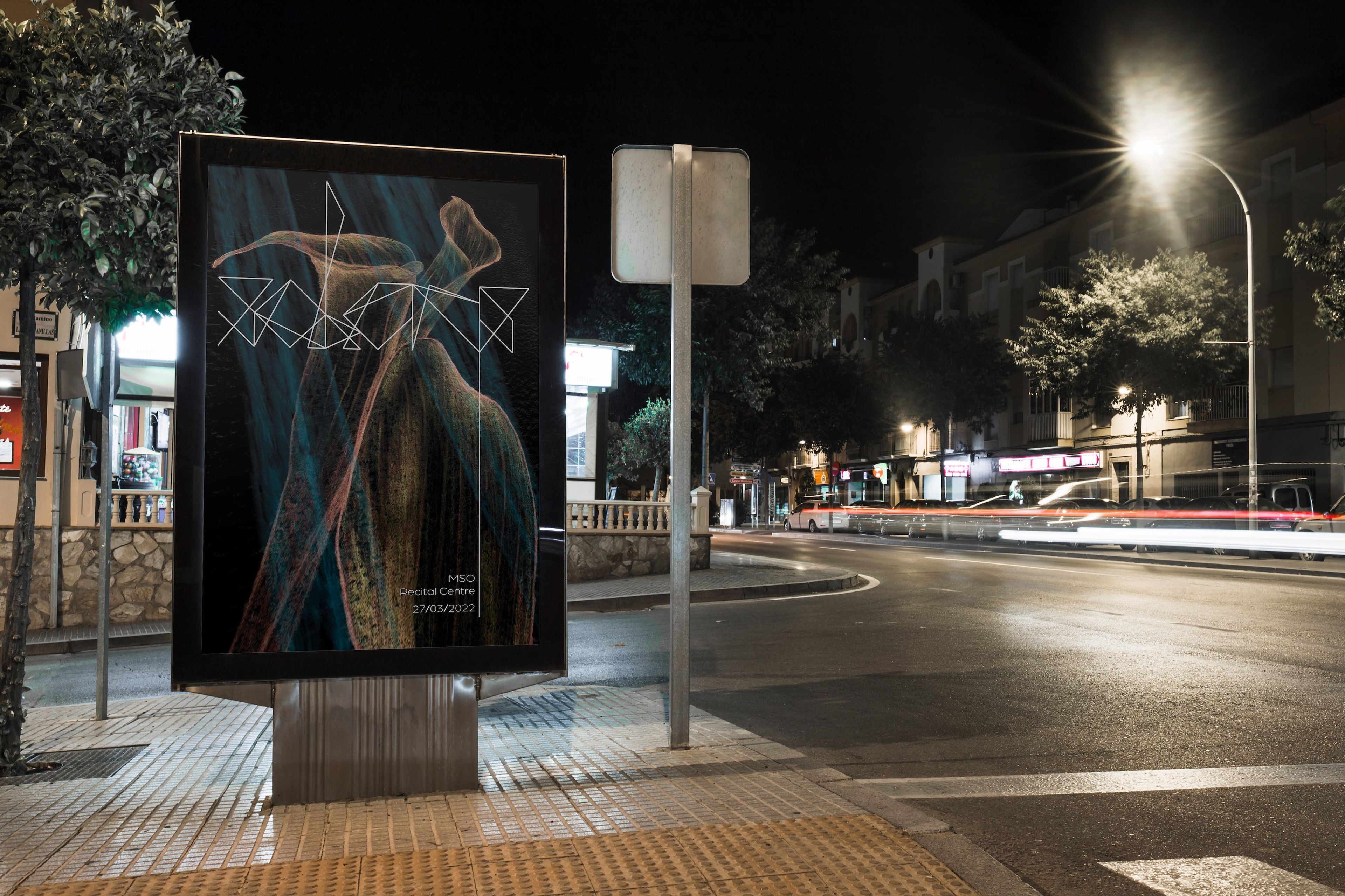 Poster promoting a concert titled "Solaris" at the MSO Recital Centre, mounted on a street billboard at night. The poster features abstract, flowing imagery resembling fabric or light trails, with a minimalist, geometric typeface for the title.