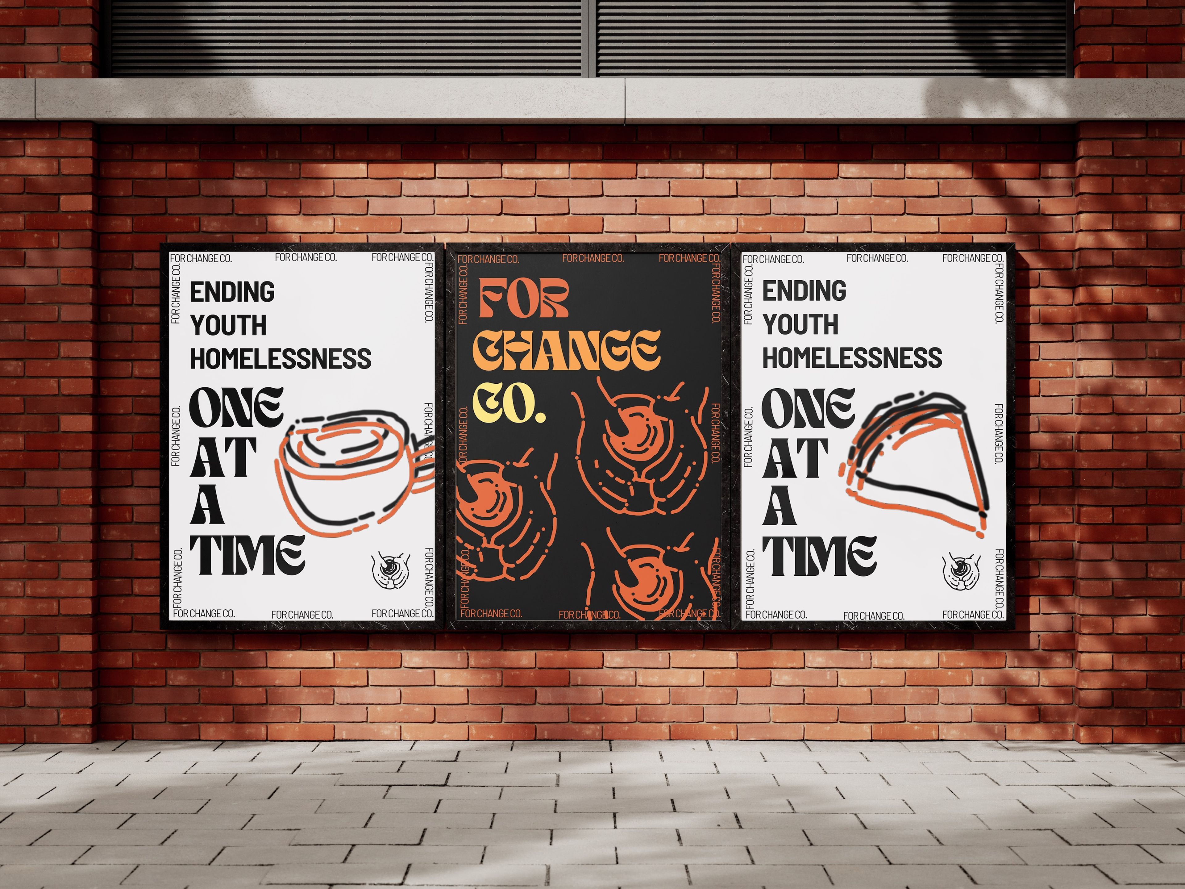 Three campaign posters on brick wall for 'For Change Co.' addressing youth homelessness. Two identical white posters reading 'ENDING YOUTH HOMELESSNESS ONE AT A TIME' flank a central black poster with orange psychedelic design. Each poster features a stylised bowl motif and repeating company name border.