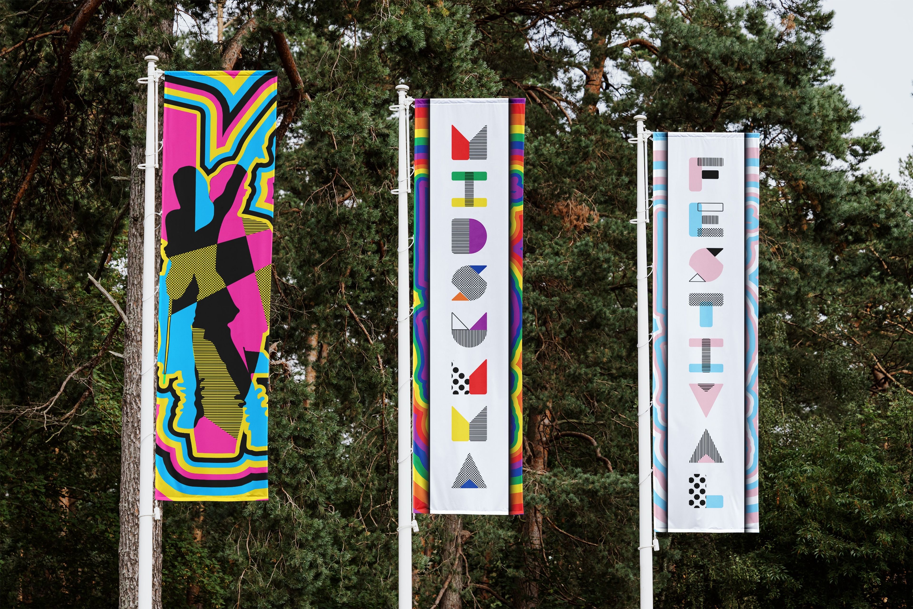 Three vertical banners for the Midsumma Festival. The central banners spell out "MIDSUMMA" and "FESTIVAL" in a playful, geometric typeface, flanked by colourful, abstract silhouettes on either side.