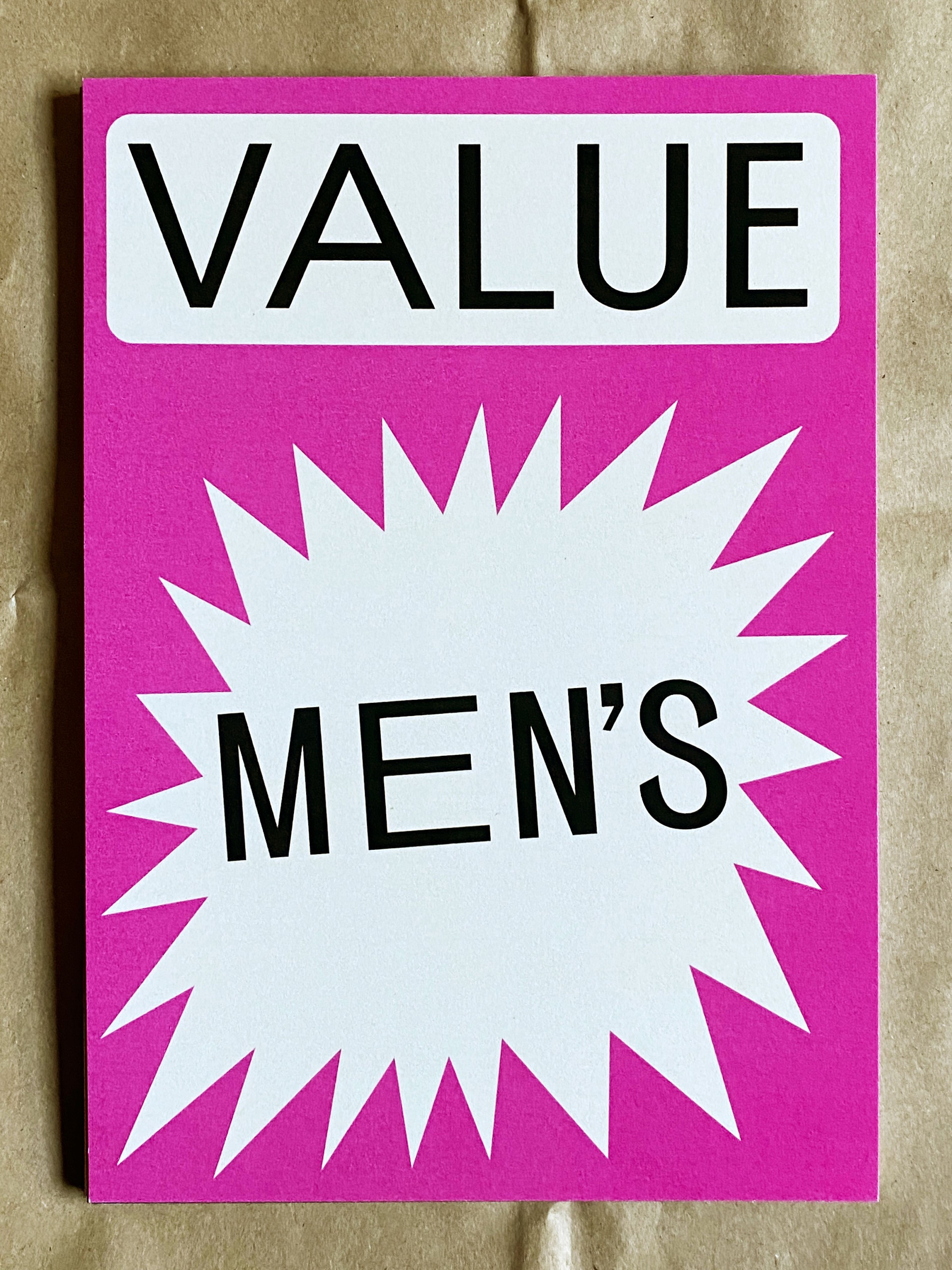 A pink and white graphic with bold text. The top word, "VALUE," appears in a white box on a bright pink background, while "MEN’S" is displayed in black on a white starburst shape.