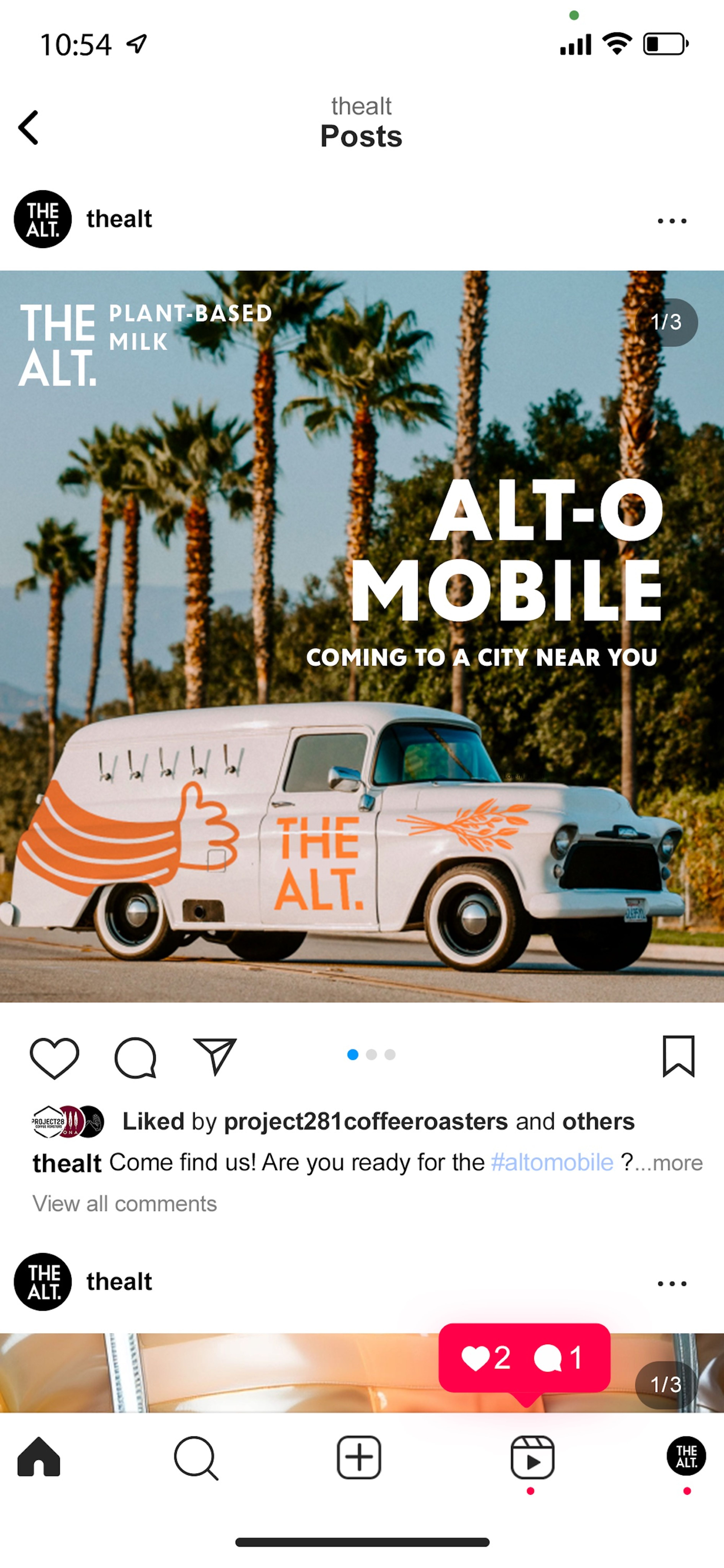 Instagram post from 'The Alt' showcasing their 'ALT-O MOBILE', a vintage delivery van branded in white with orange graphics and palm trees in background. Clean typography announces 'COMING TO A CITY NEAR YOU'.