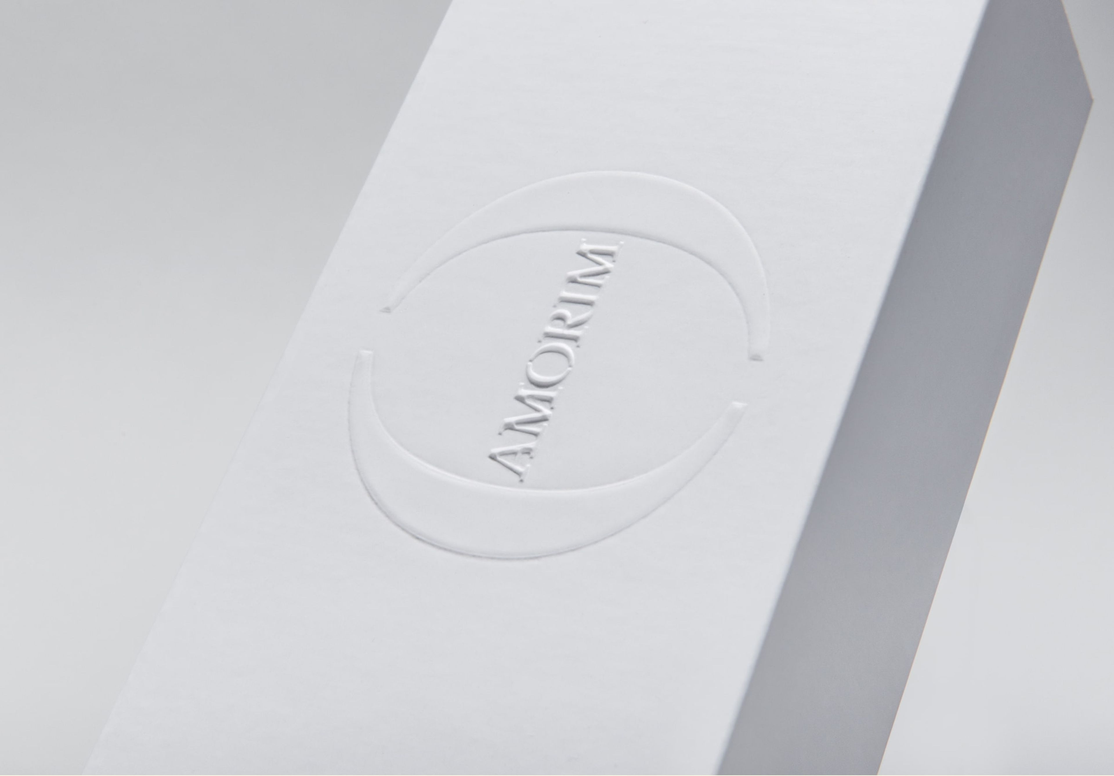 Embossing on white rigid box.