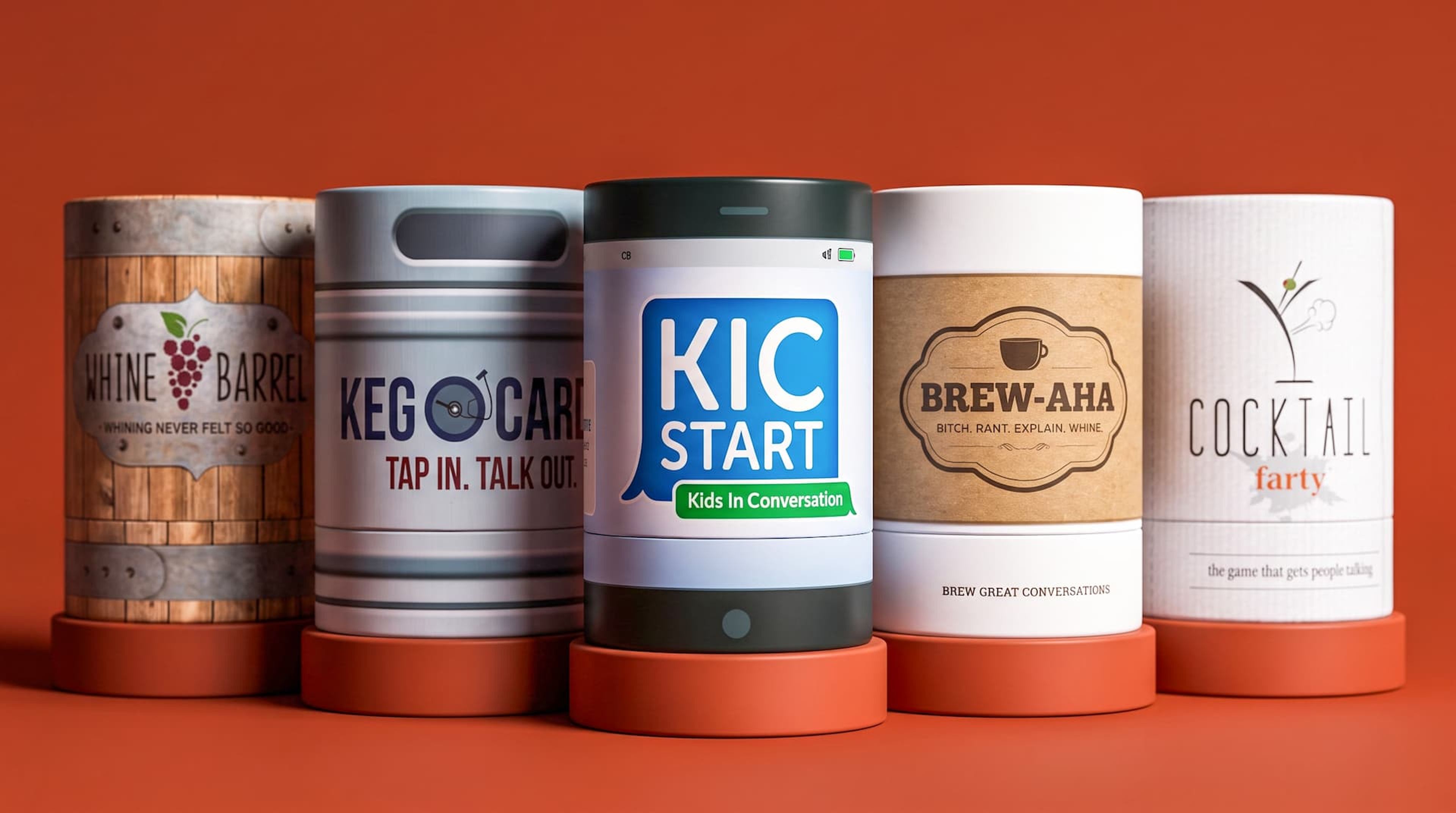 A row of five closed cylindrical conversation game tubes displayed on round terracotta risers against a matching background.