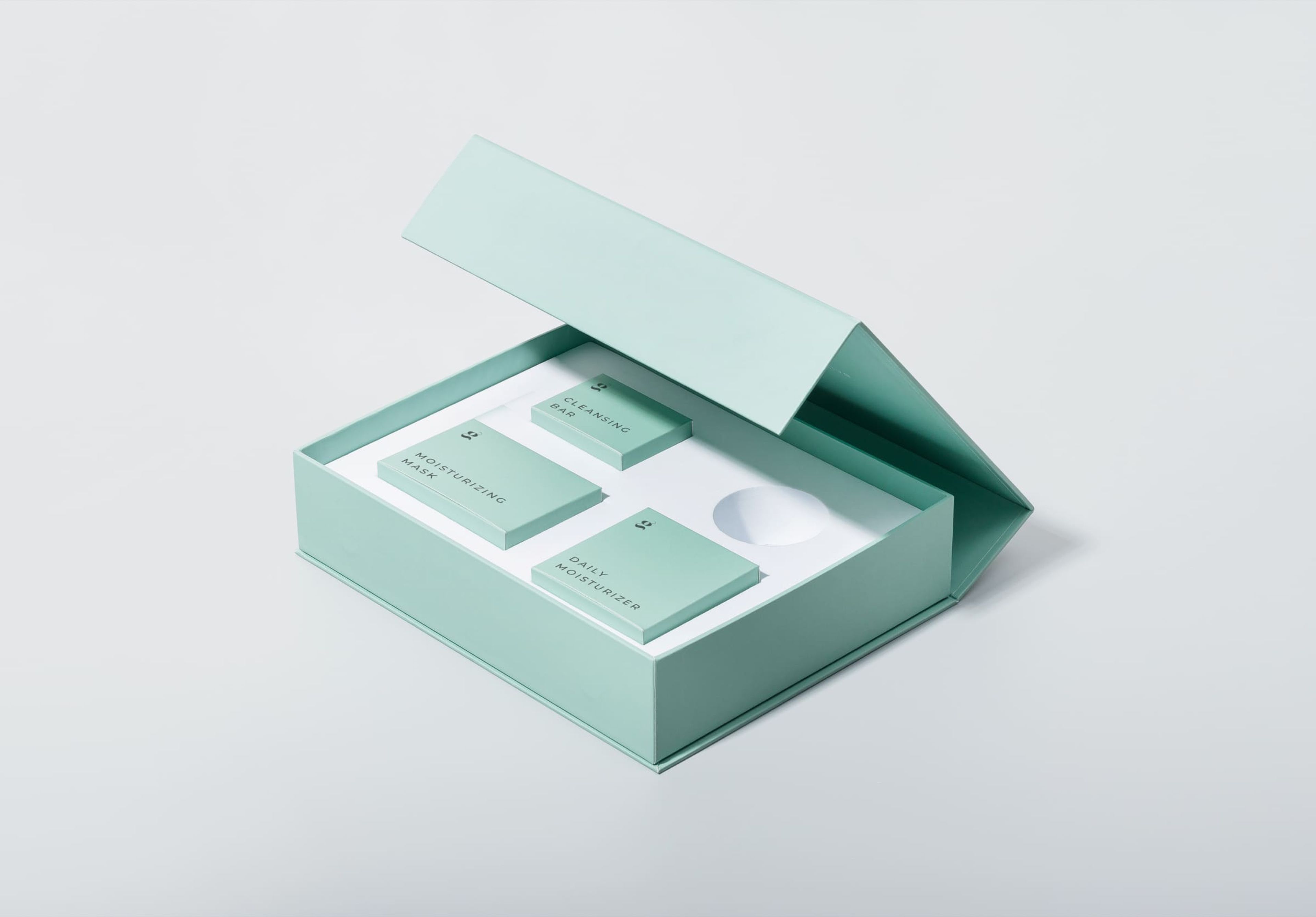 Mint rigid box as gift box set with multiple products and custom insert.