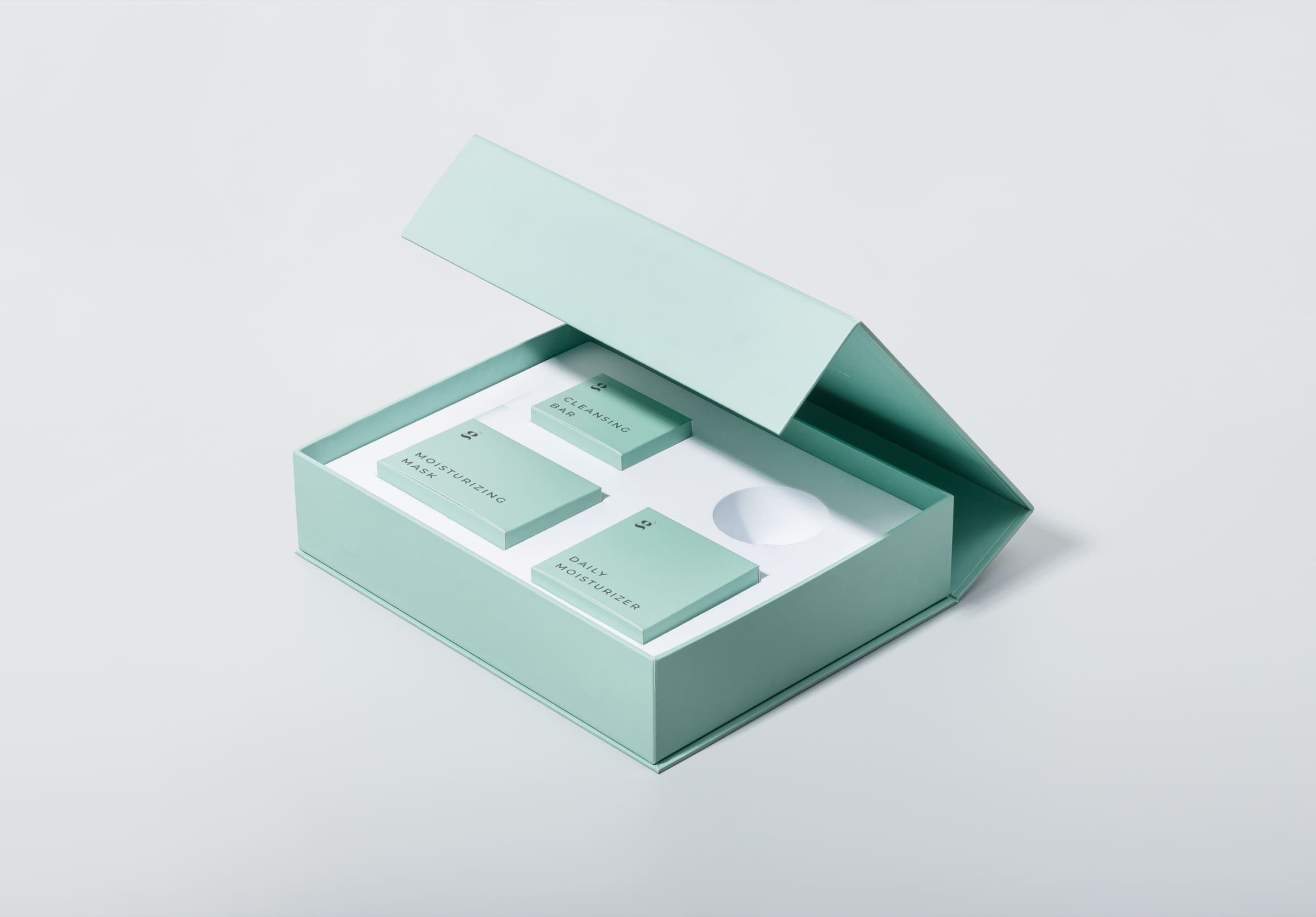 Mint rigid box as gift box set with multiple products and custom insert.