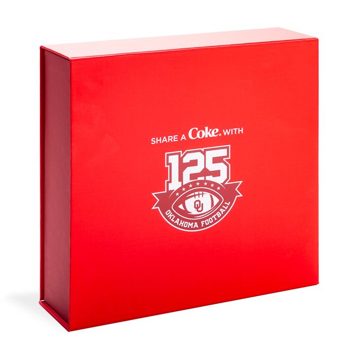 Upright red rigid box with silver foil stamping for the Coca-Cola and Oklahoma Football 125th anniversary.