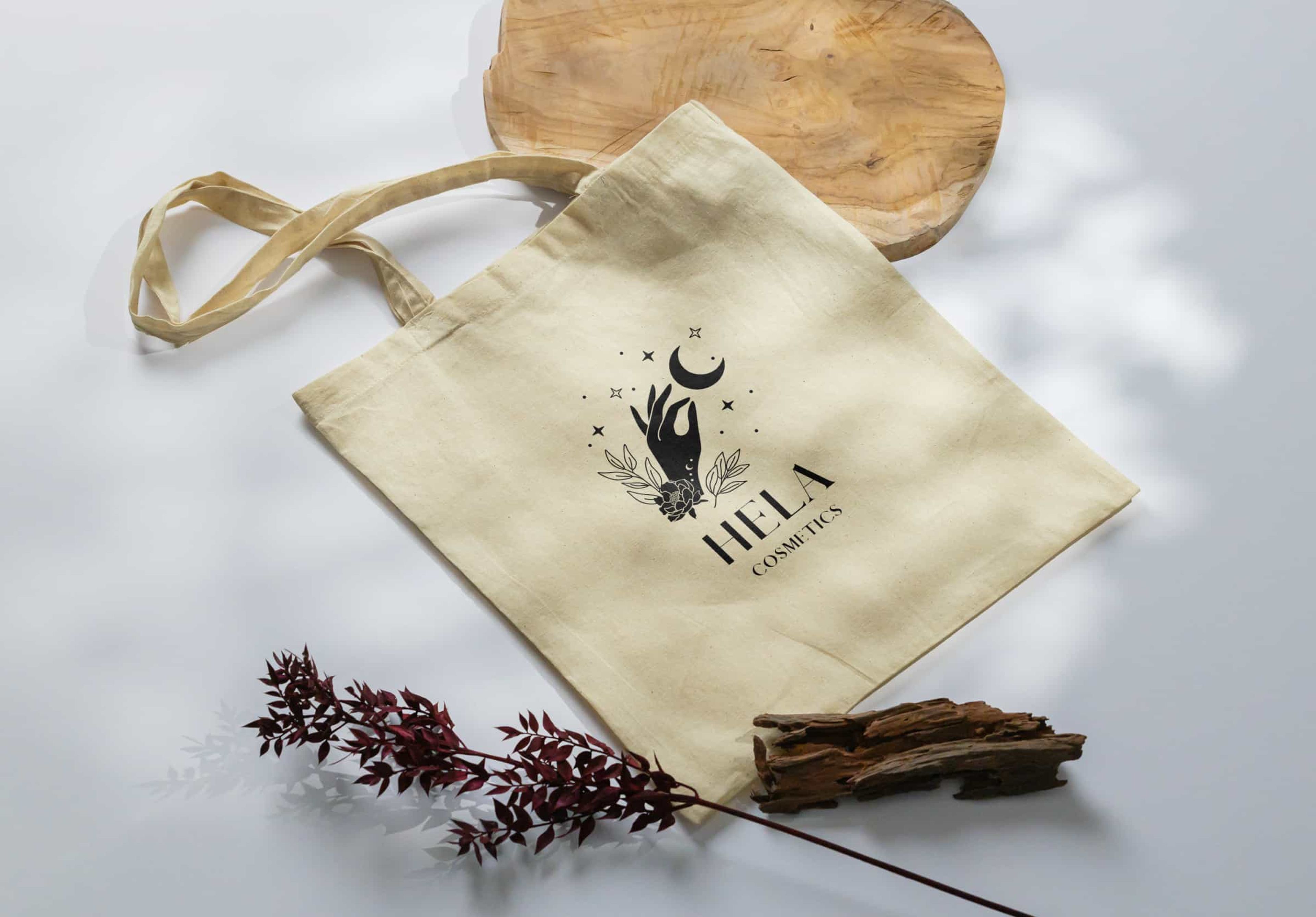 hela cosmetic logo on canvas tote bag