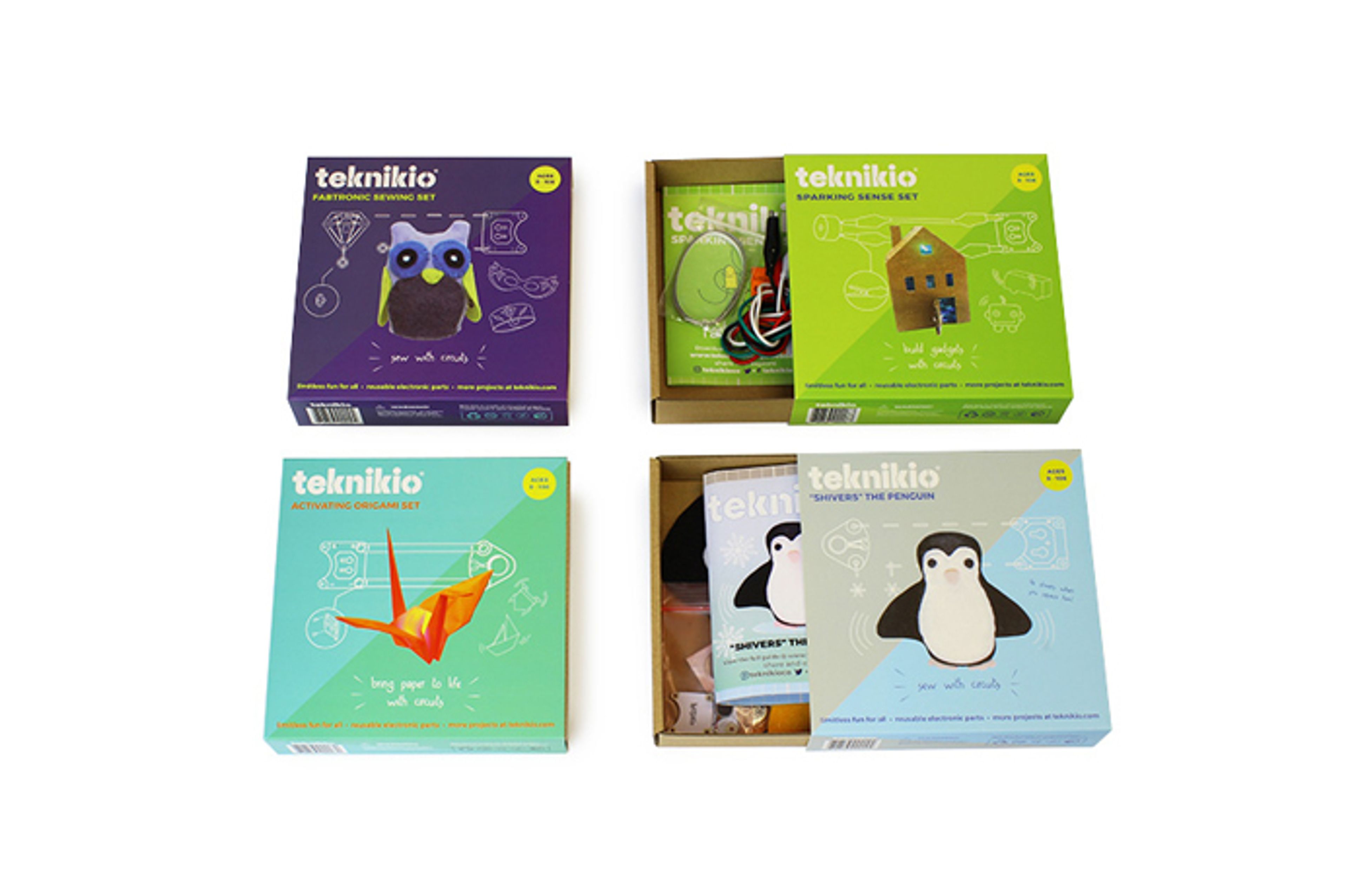 Four Teknikio craft set boxes, two open and two closed, featuring colorful sleeves over kraft paper trays.