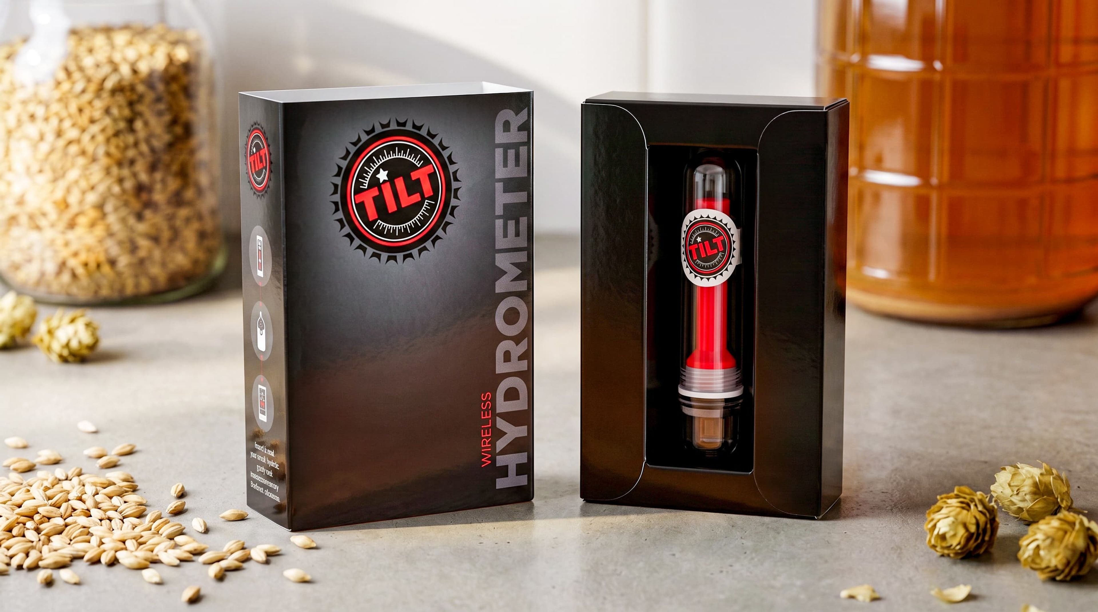 Closed black Tilt Wireless Hydrometer box with red branding and usage icons on a white background.