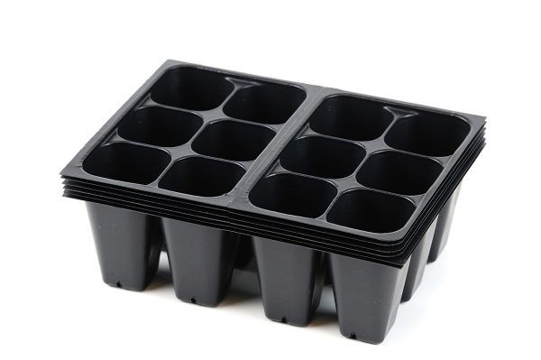 A black molded plastic insert for custom packaging.