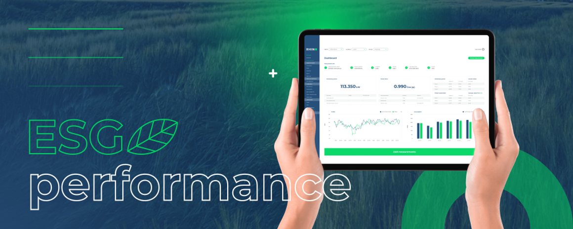 ESG performance dashboard on a tablet, held above grass