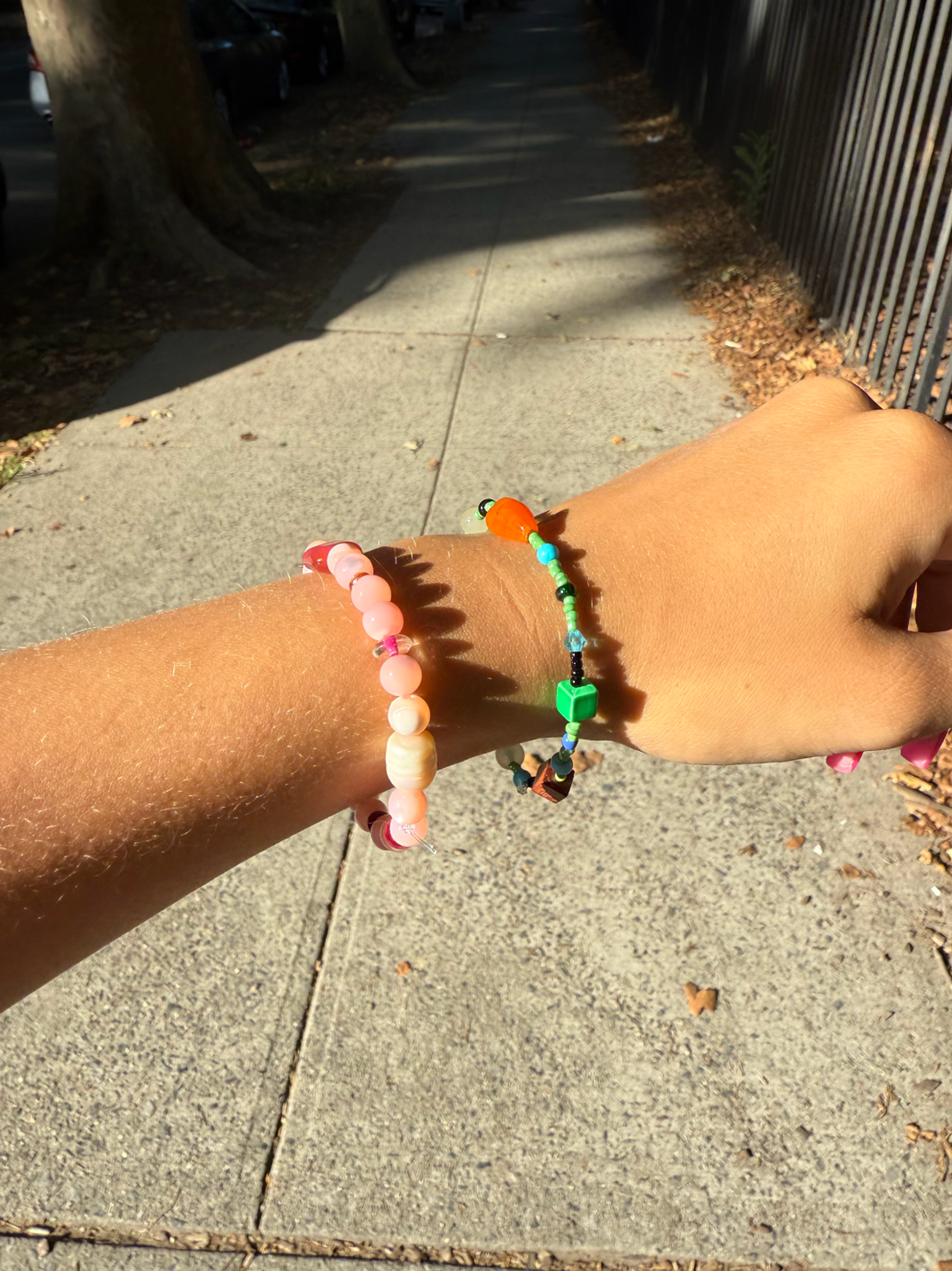 green and pink bracelet