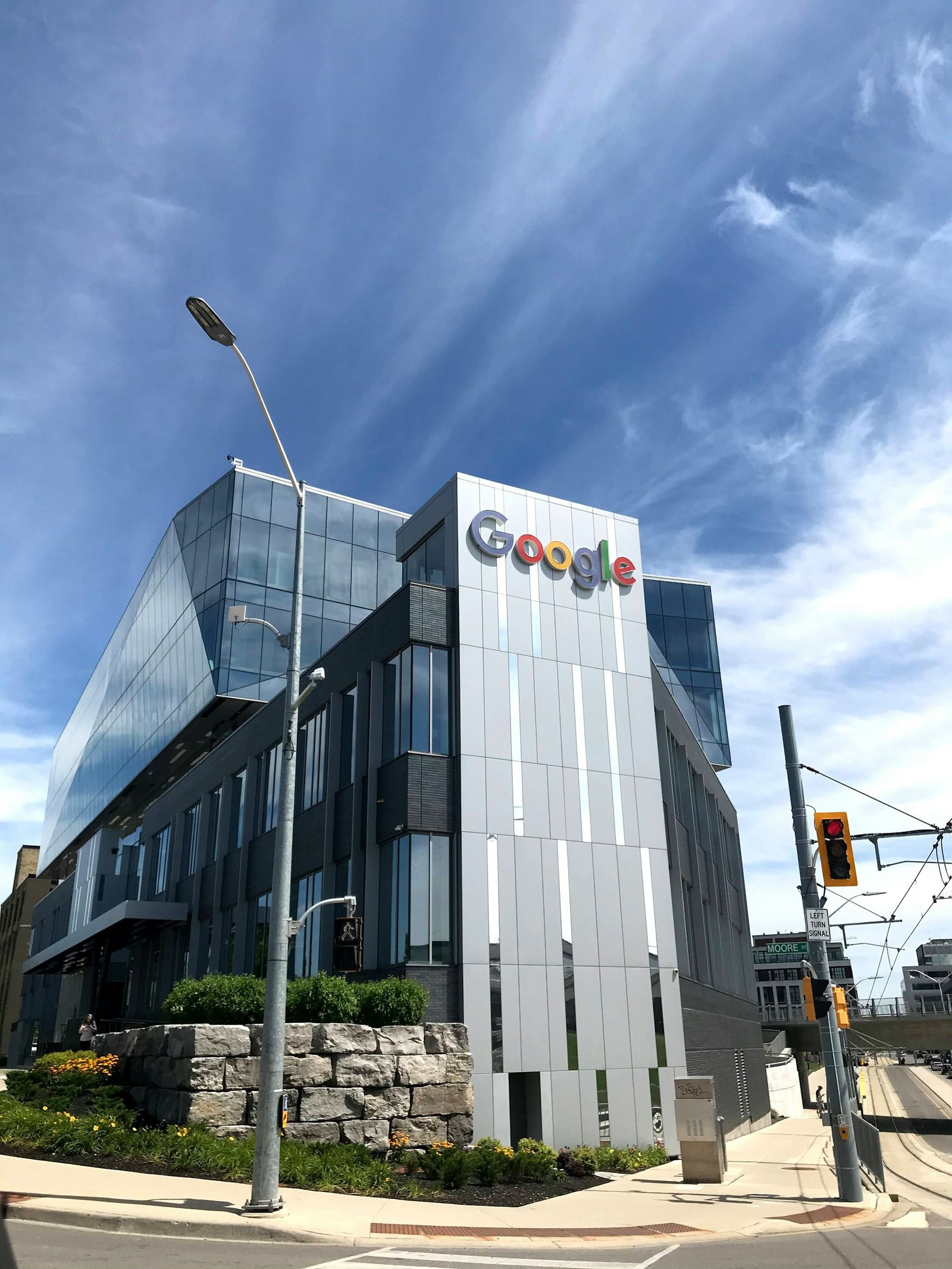 Google office building with the Google logo against a blue sky