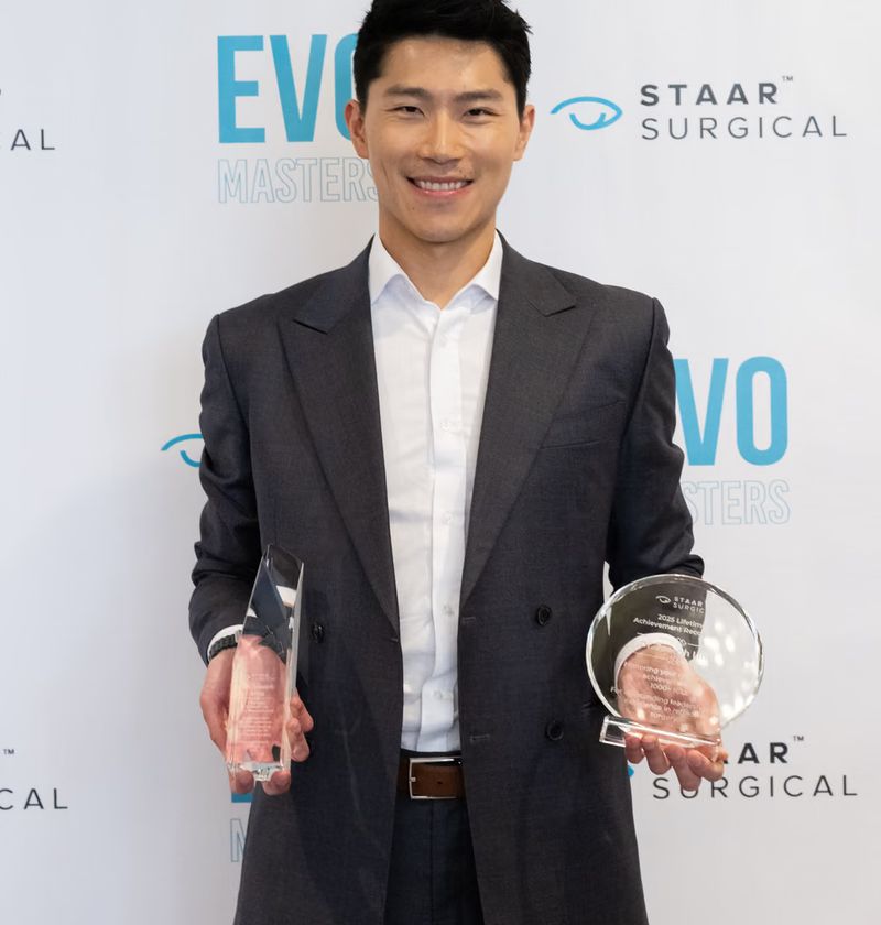 Dr. Joseph Ling holding STAAR Surgical awards