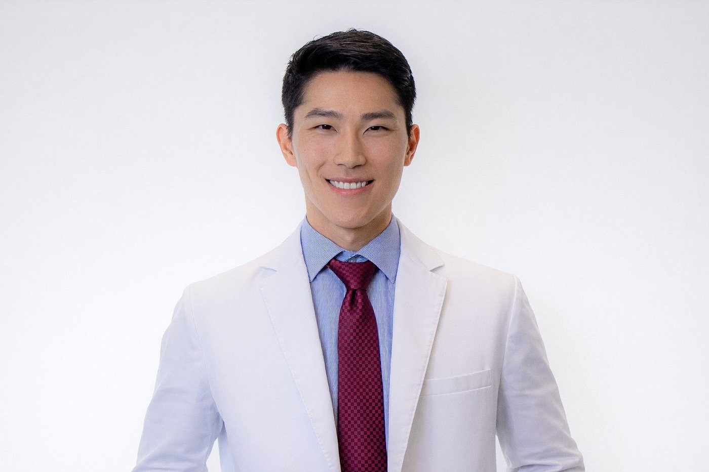 Dr. Joseph Ling in conversation with a patient