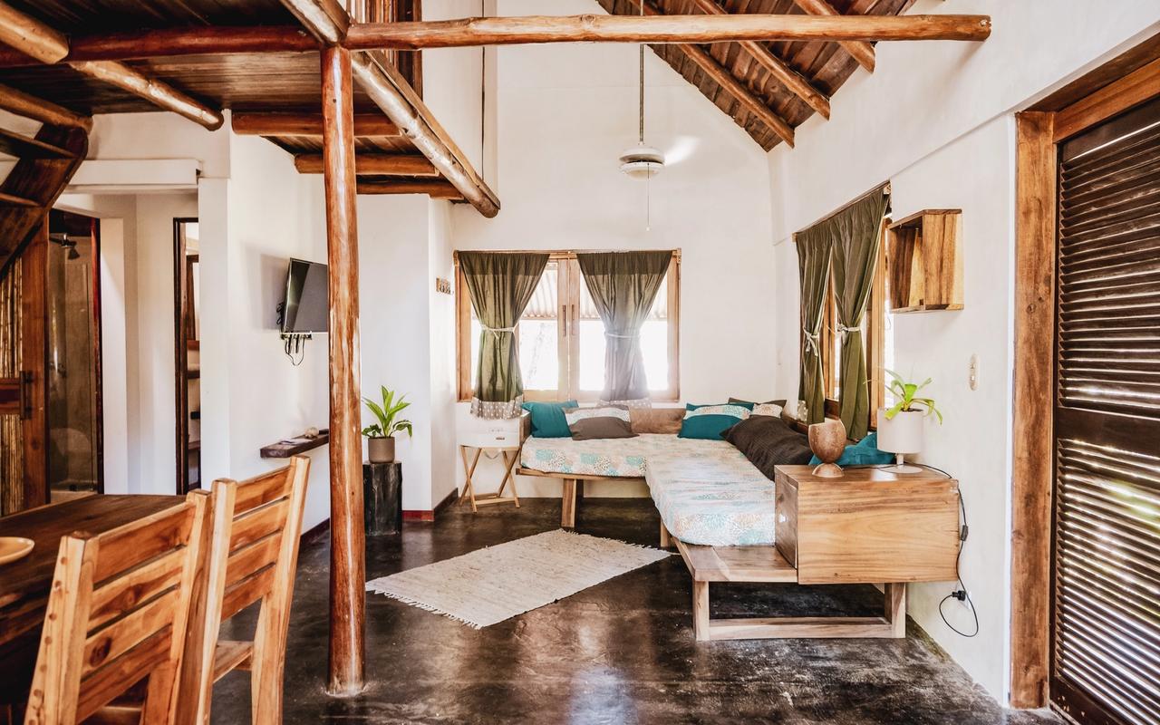 Living y comedor de una casa en Santa Teresa