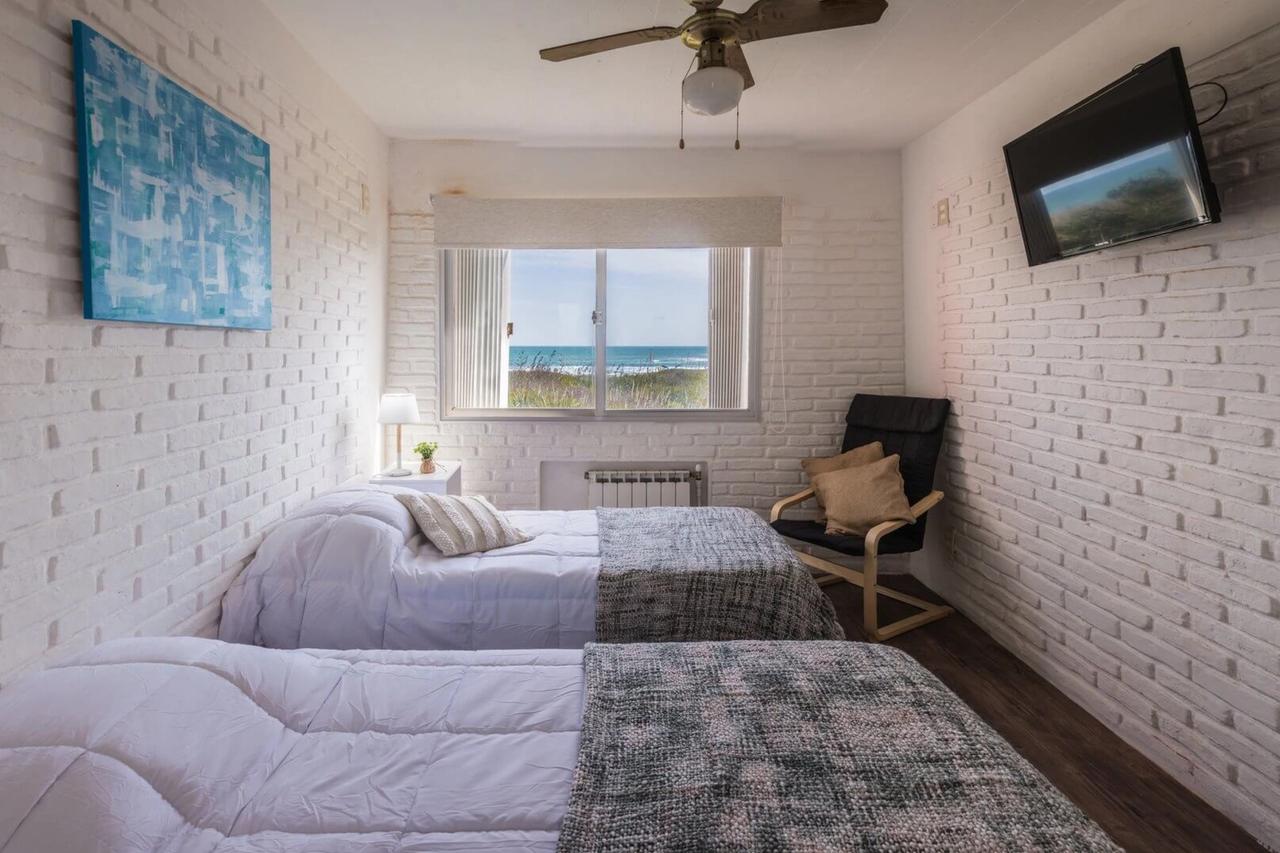 Habitación doble con vista al mar en Portobello Suites