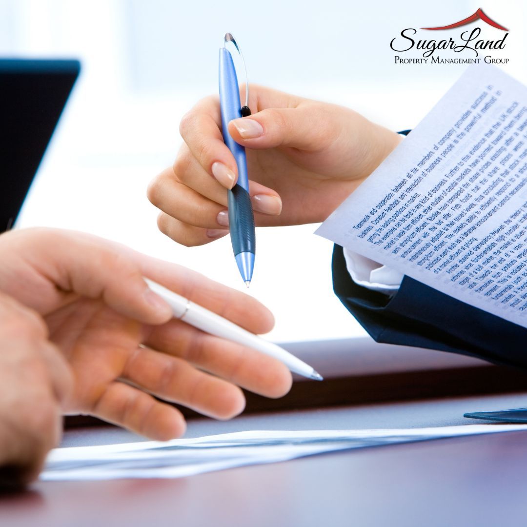 Texas landlord reviewing a property management contract before switching companies