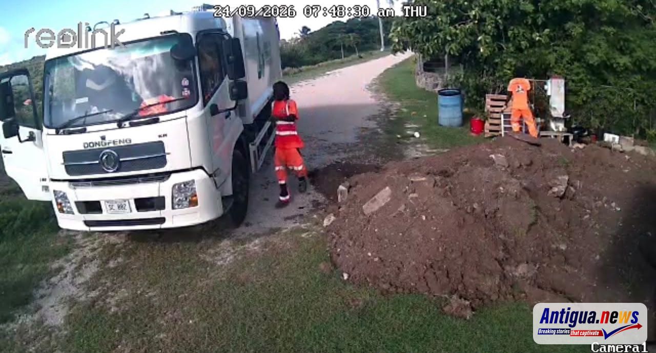 Garbage men collecting from persons yard