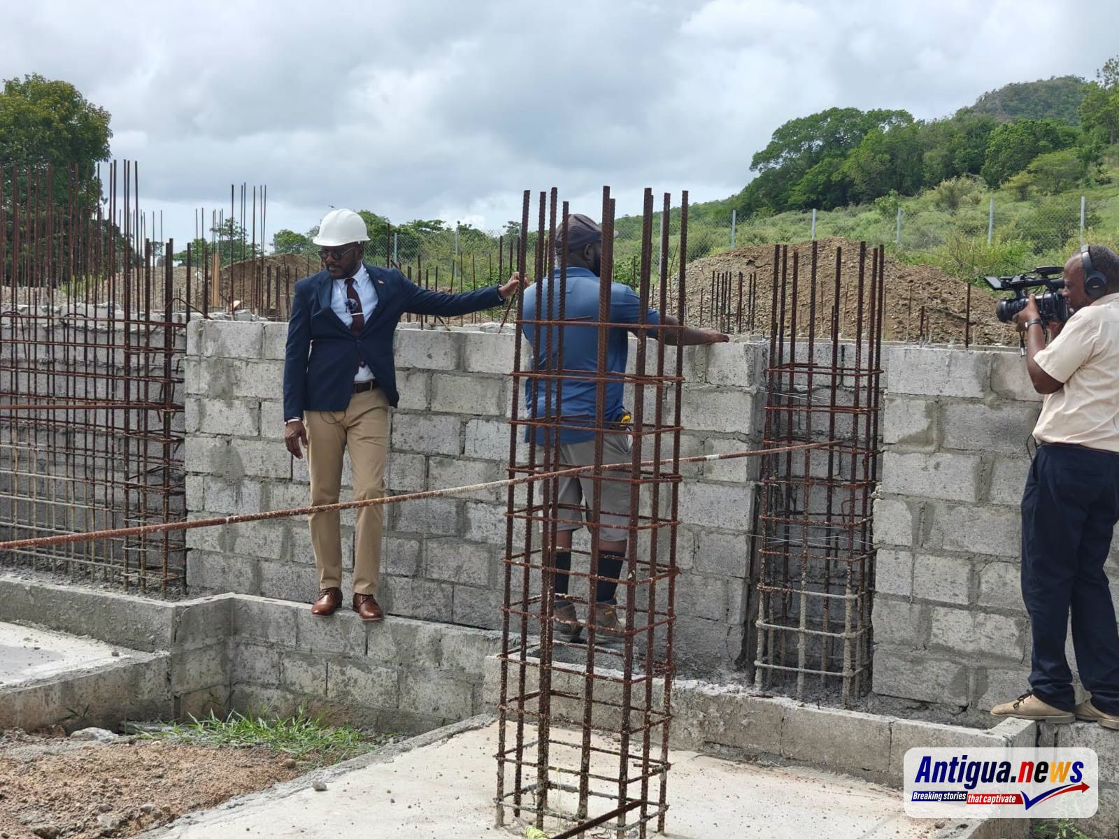 Education Minister Daryll Matthew visits the construction site