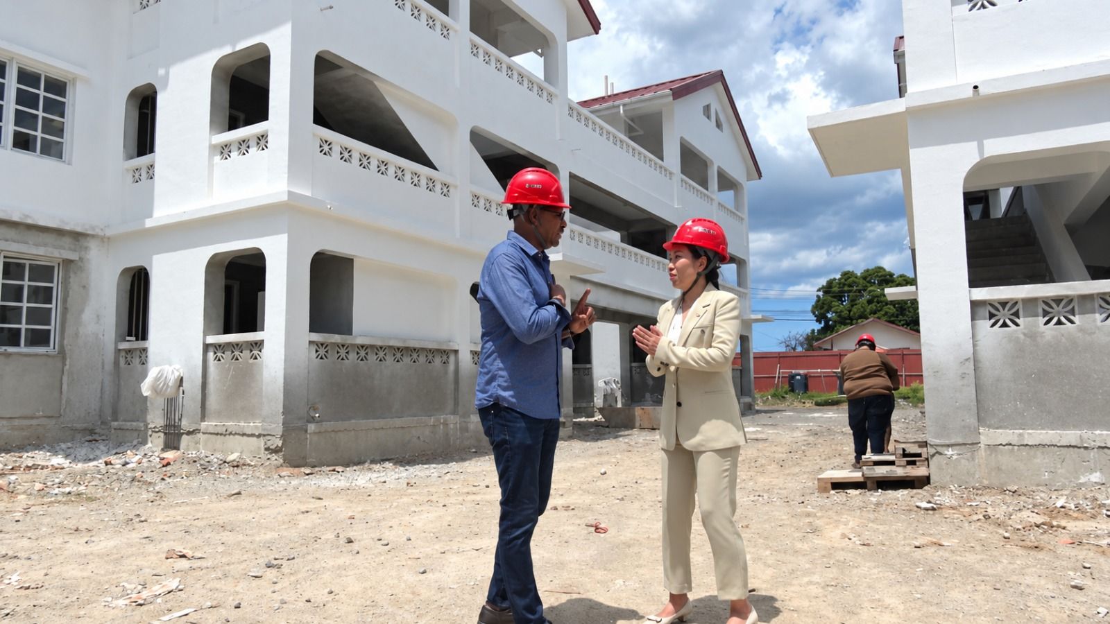 Prime Minister Gaston Browne speaks to Chinese Ambassador Jiang Wei during a recent site visit at Booby Alley