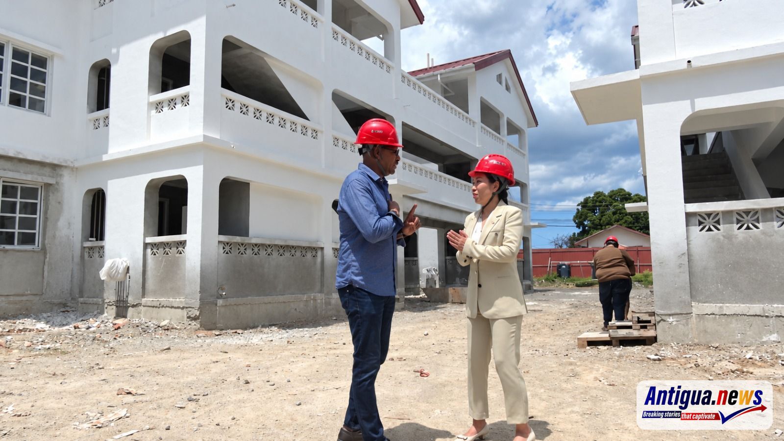 Prime Minister Gaston Browne speaks to Chinese Ambassador Jiang Wei during a recent site visit at Booby Alley