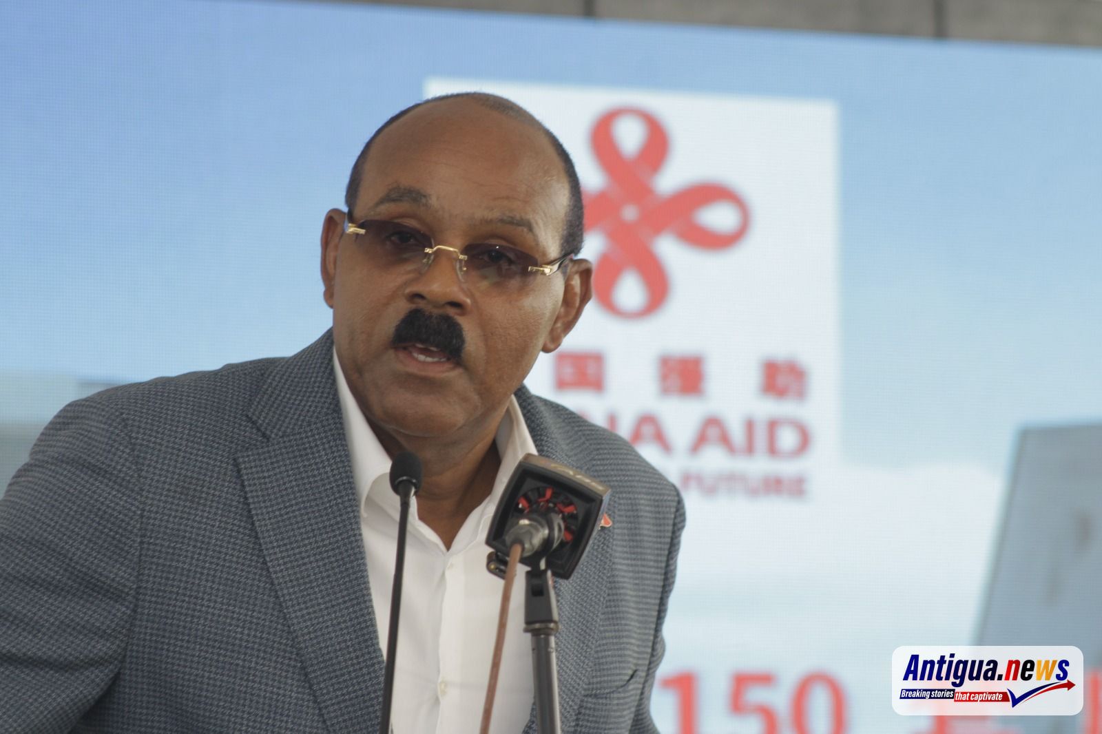 Prime Minister Gaston Browne addressing those attended the offical handing over of Pelican Court