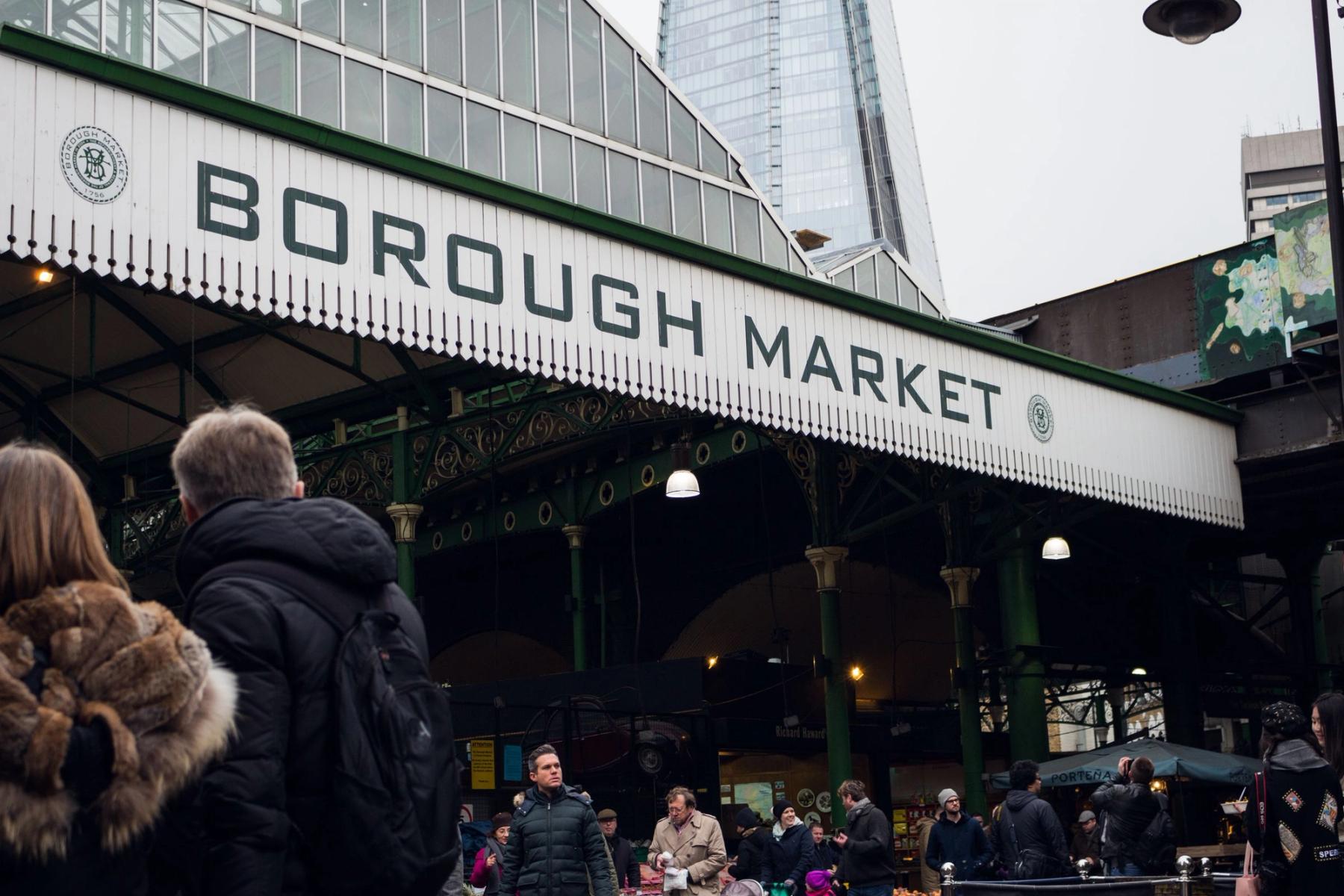 People moving through Borough Market in London