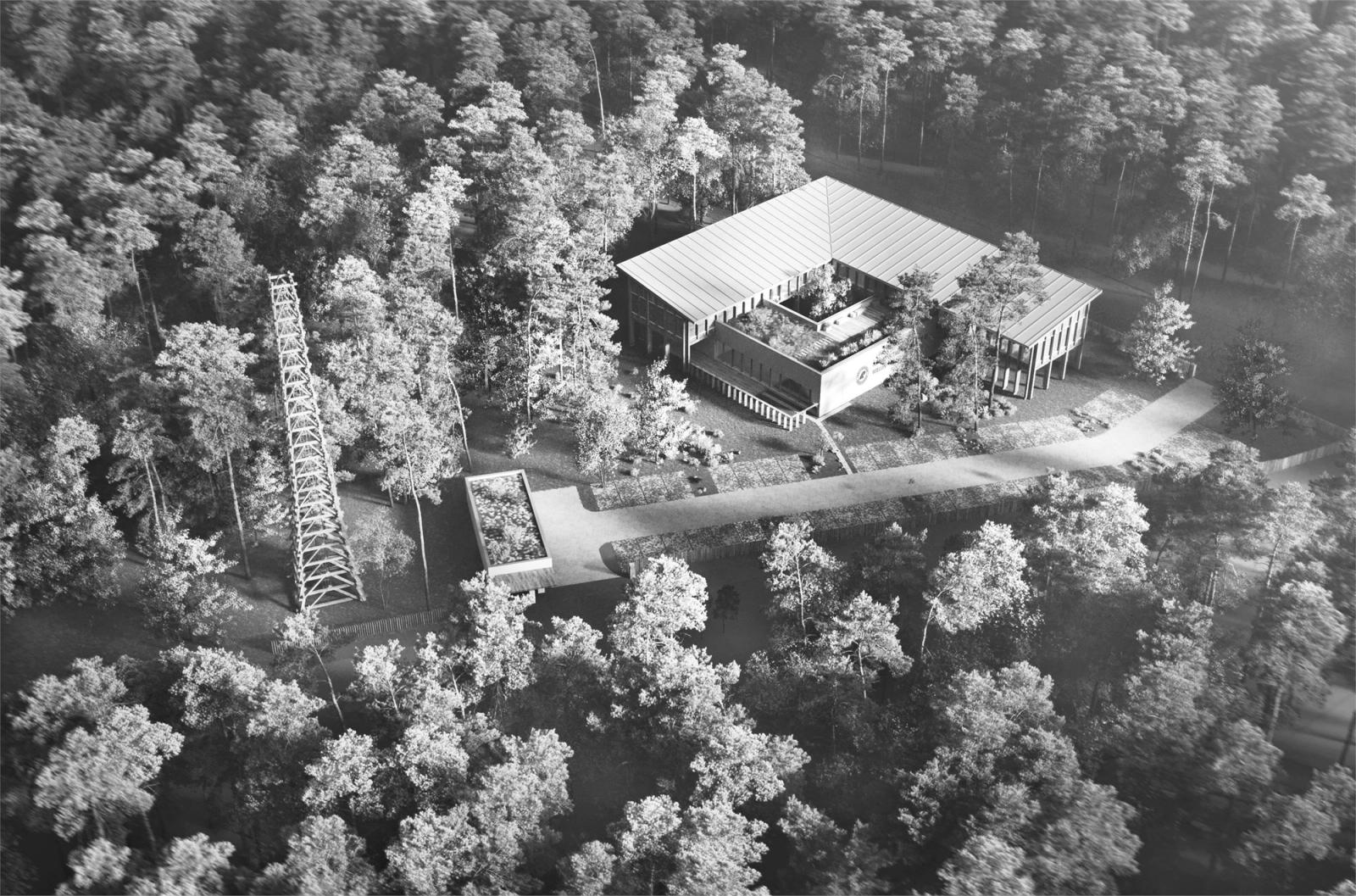 Monochromatyczny widok siedziby nadleśnictwa w krajobrazie leśnym.