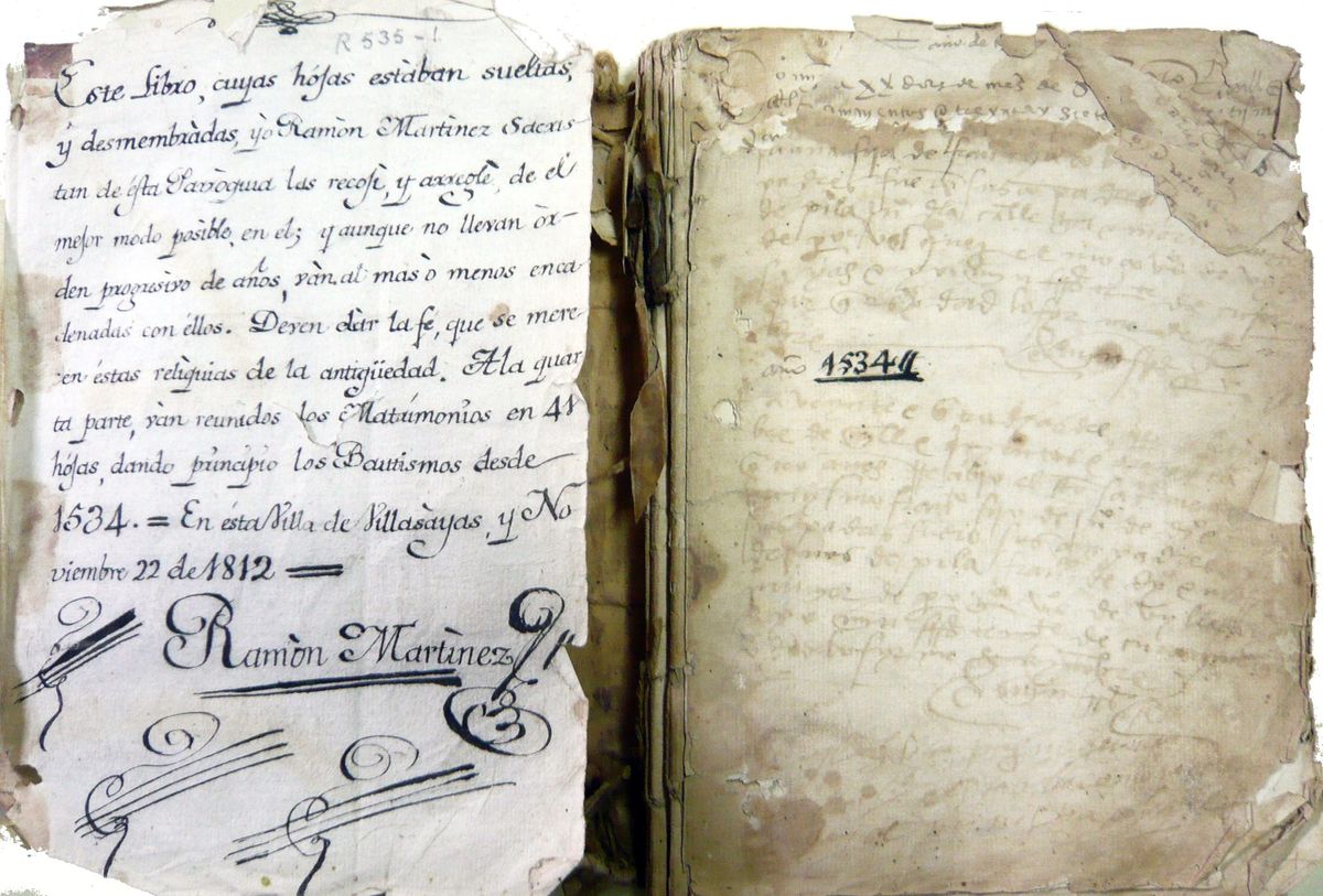 An open parish register: a neat 1812 note on a loose leaf beside a page of faded, older entries.