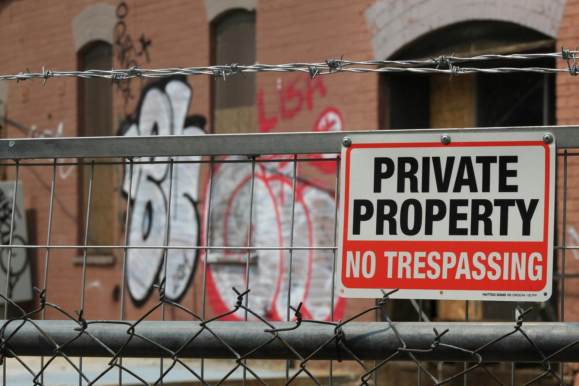 red and white private property