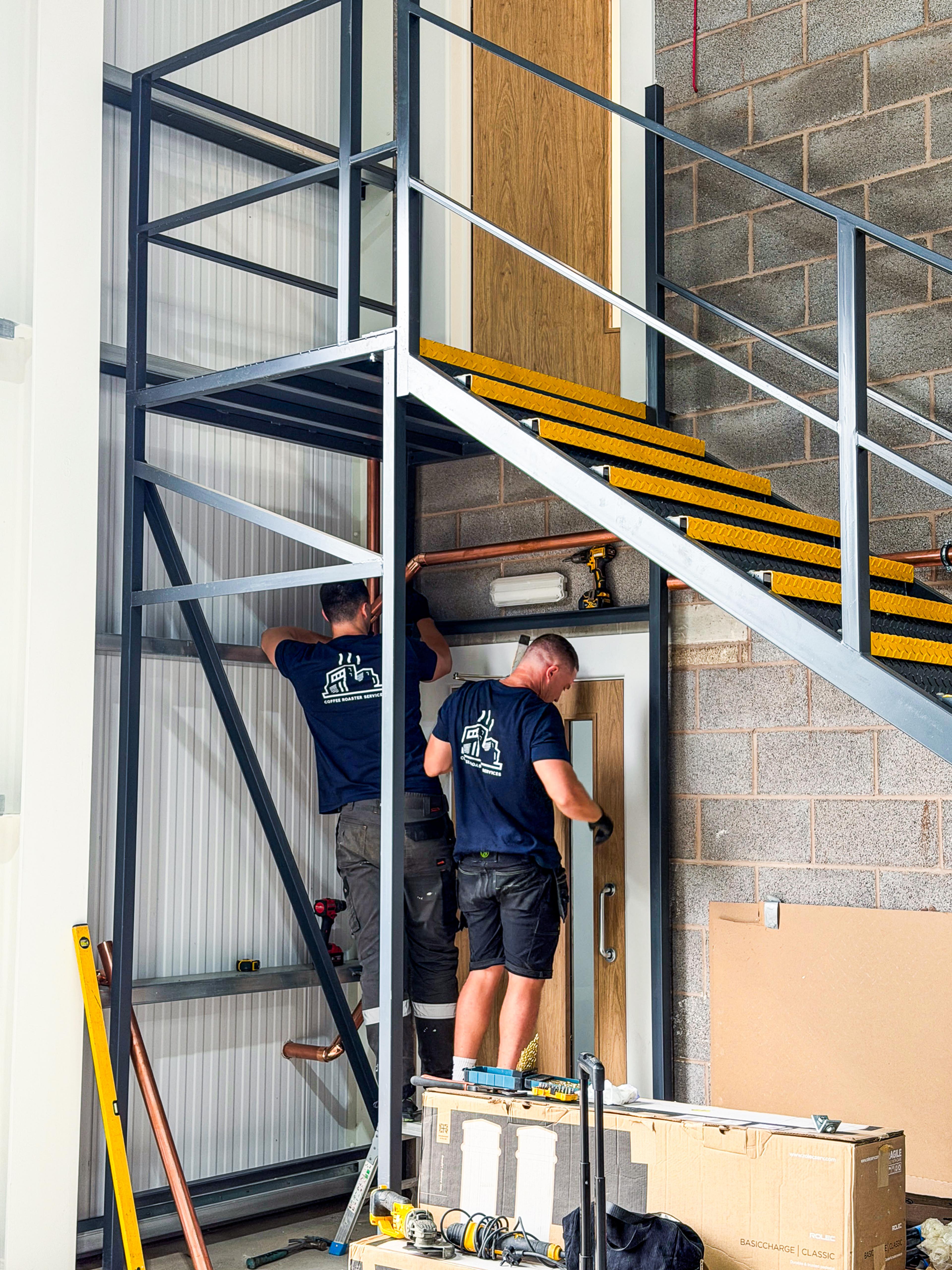 The Coffee Roaster Services team installing a coffee roaster