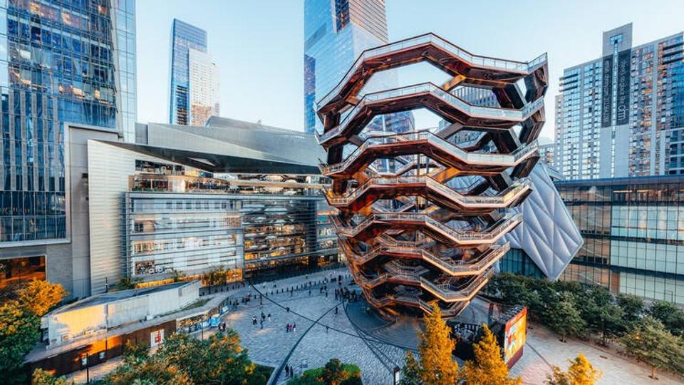 The Vessel at Hudson Yards, a honeycomb of copper stairways, among glass towers.
