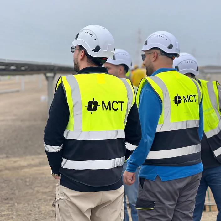 Engineers in safety helmets