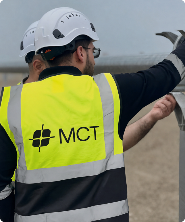 MCT engineers in safety gear on site