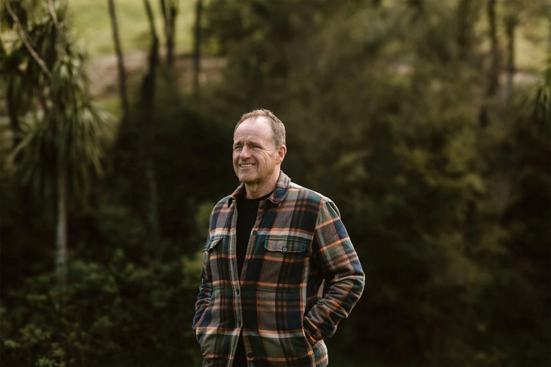 Patrick Fontein standing in front of forest