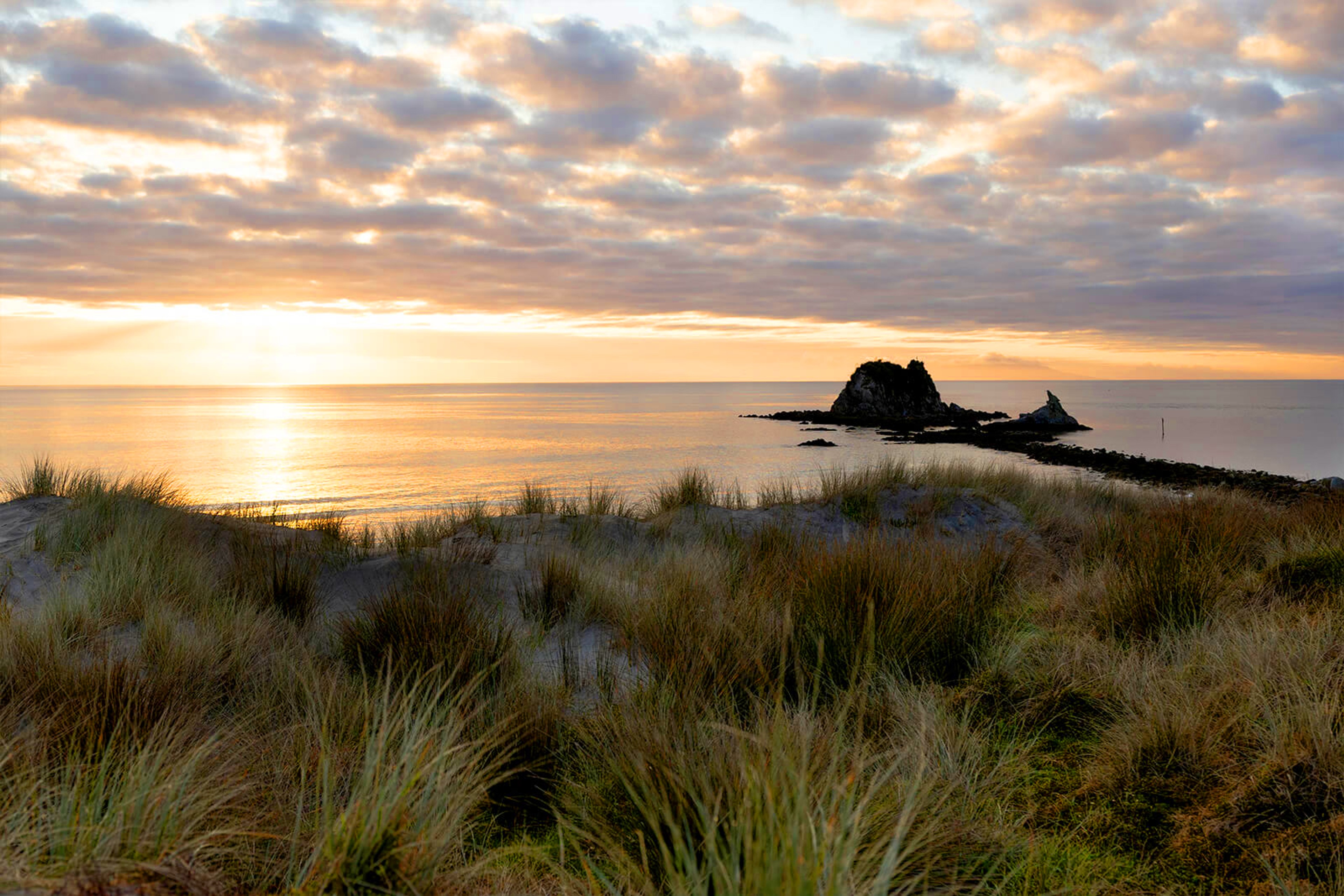 Beach and dunes at sunset