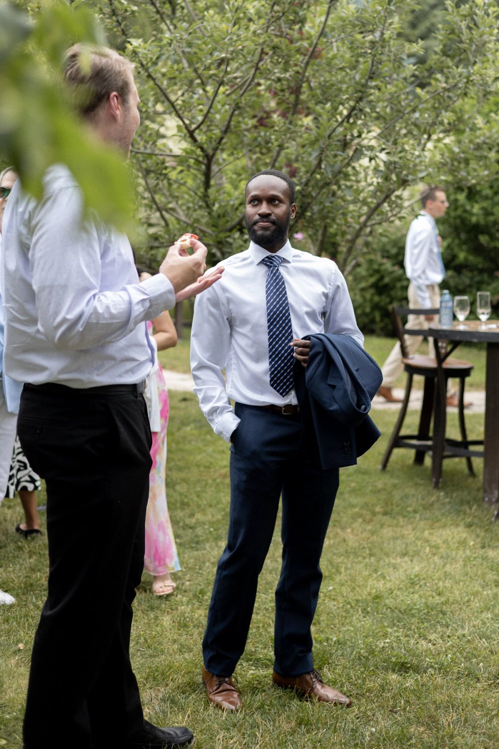 guests talking during cocktail hour at wedding in Niagara