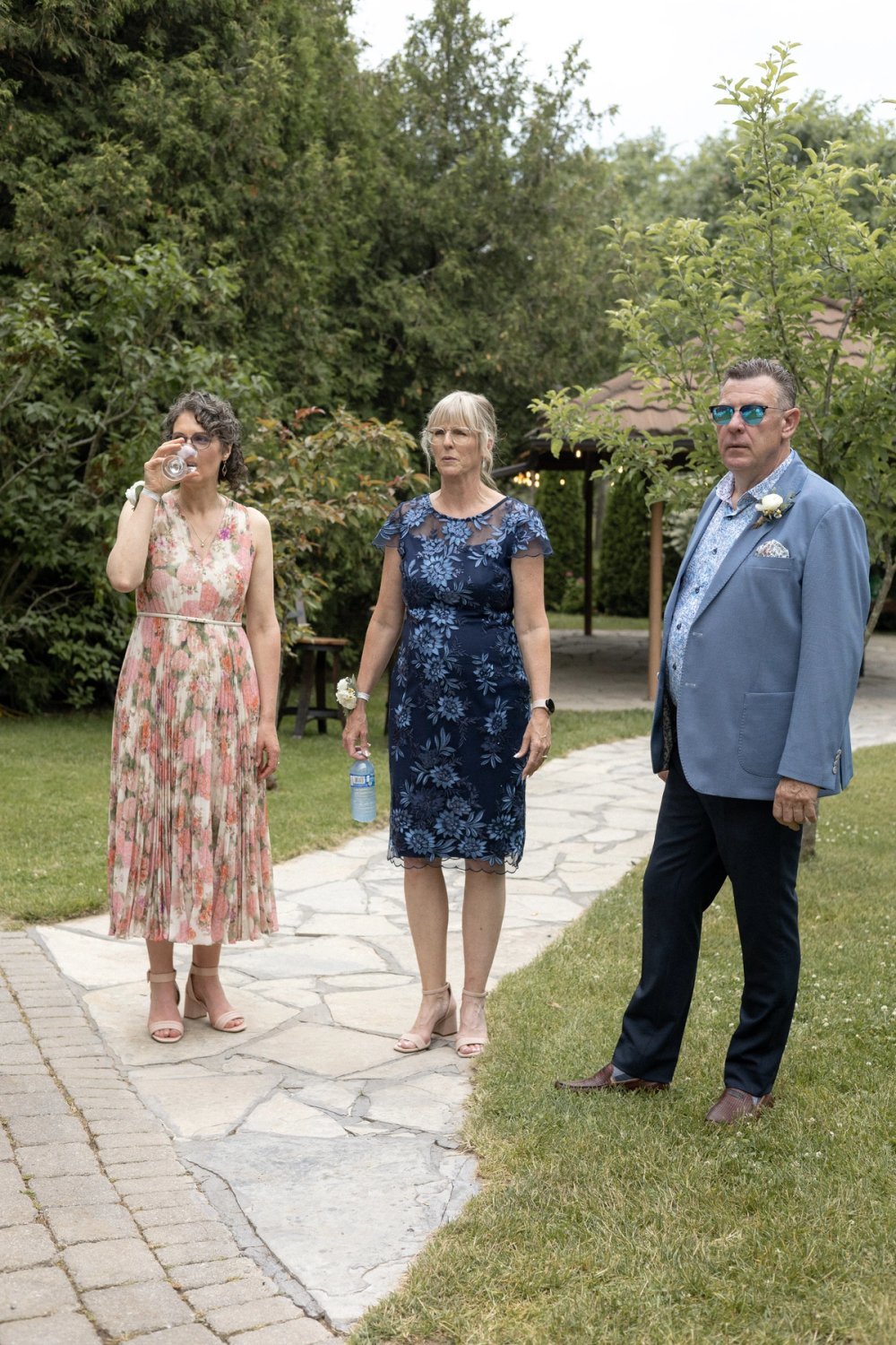 Guests arriving for summer wedding celebration