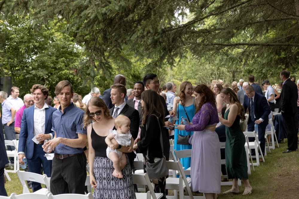 Guests heading to cocktail hour after wedding ceremony